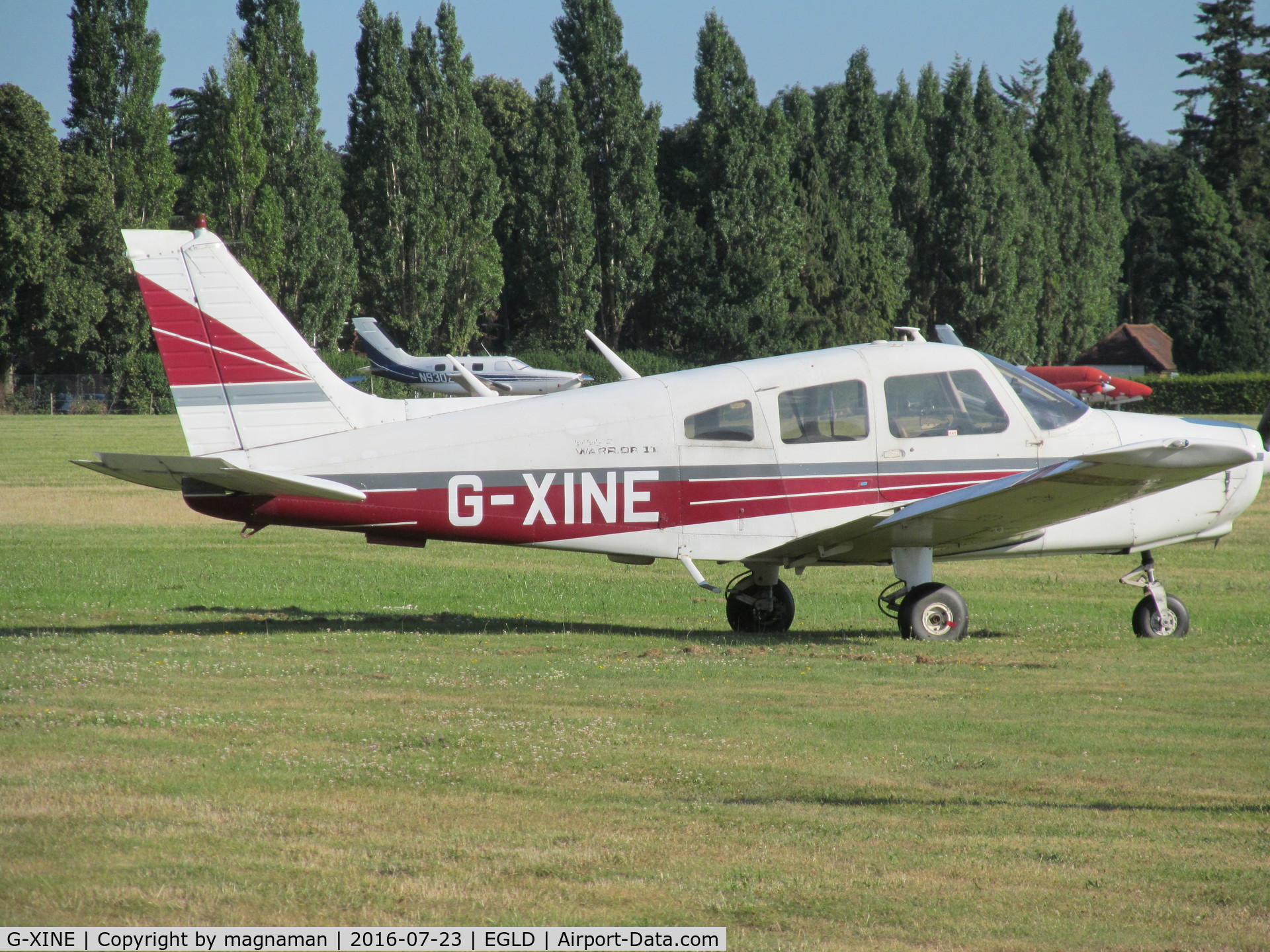 G-XINE, 1976 Piper PA-28-161 Cherokee Warrior II C/N 28-7716112, on grass at denham