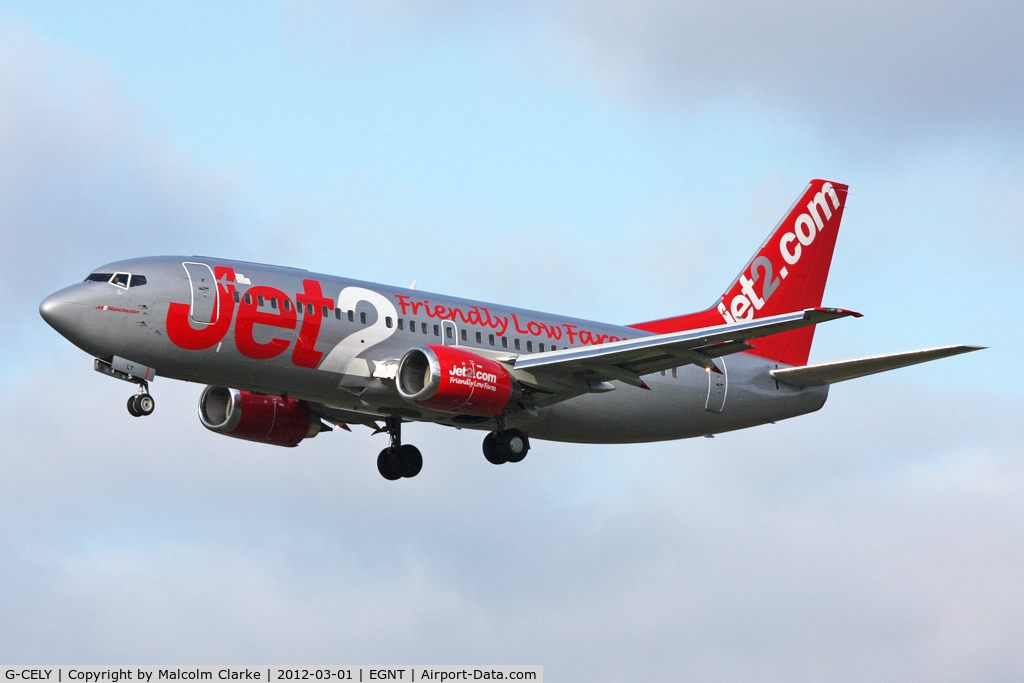 G-CELY, 1986 Boeing 737-377(QC) C/N 23662, 737-377 on approach to Runway 25 at Newcastle Airport, March 2012.