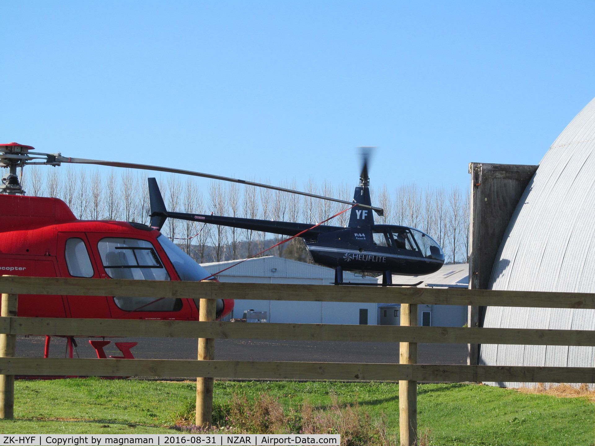ZK-HYF, Robinson R44 II C/N 10223, lifting off at ardmore