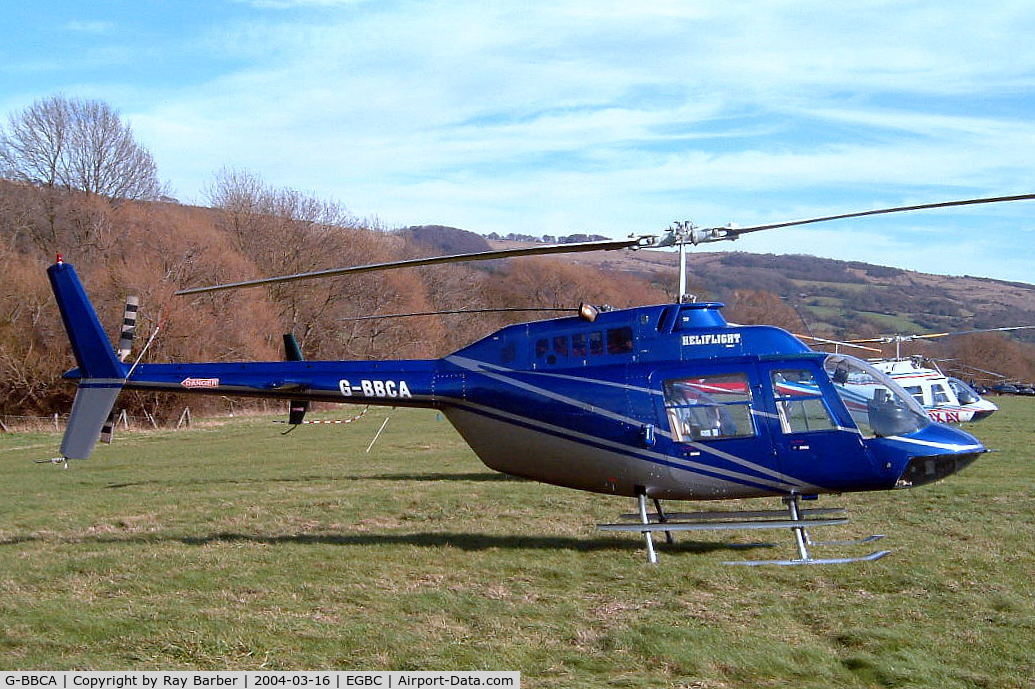 G-BBCA, 1973 Bell 206B JetRanger II C/N 1101, Bell 206B-2 Jet Ranger II [1101] (Heliflight) Cheltenham Racecourse~G 16/03/2004. Minus wording in between stripes behind cabin compared to later image.