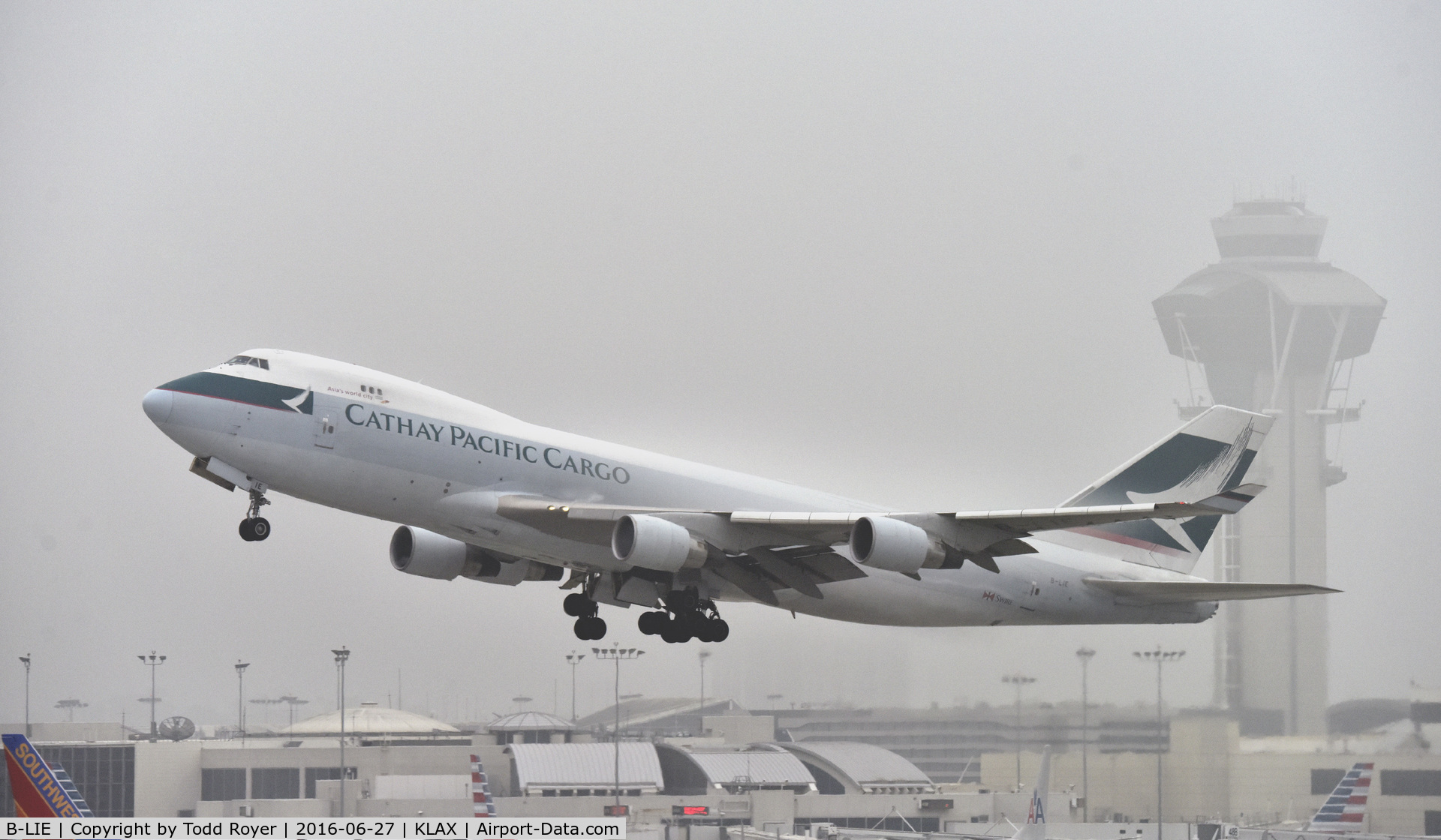 B-LIE, 2009 Boeing 747-467ERF C/N 36870, Departing LAX on a foggy morning