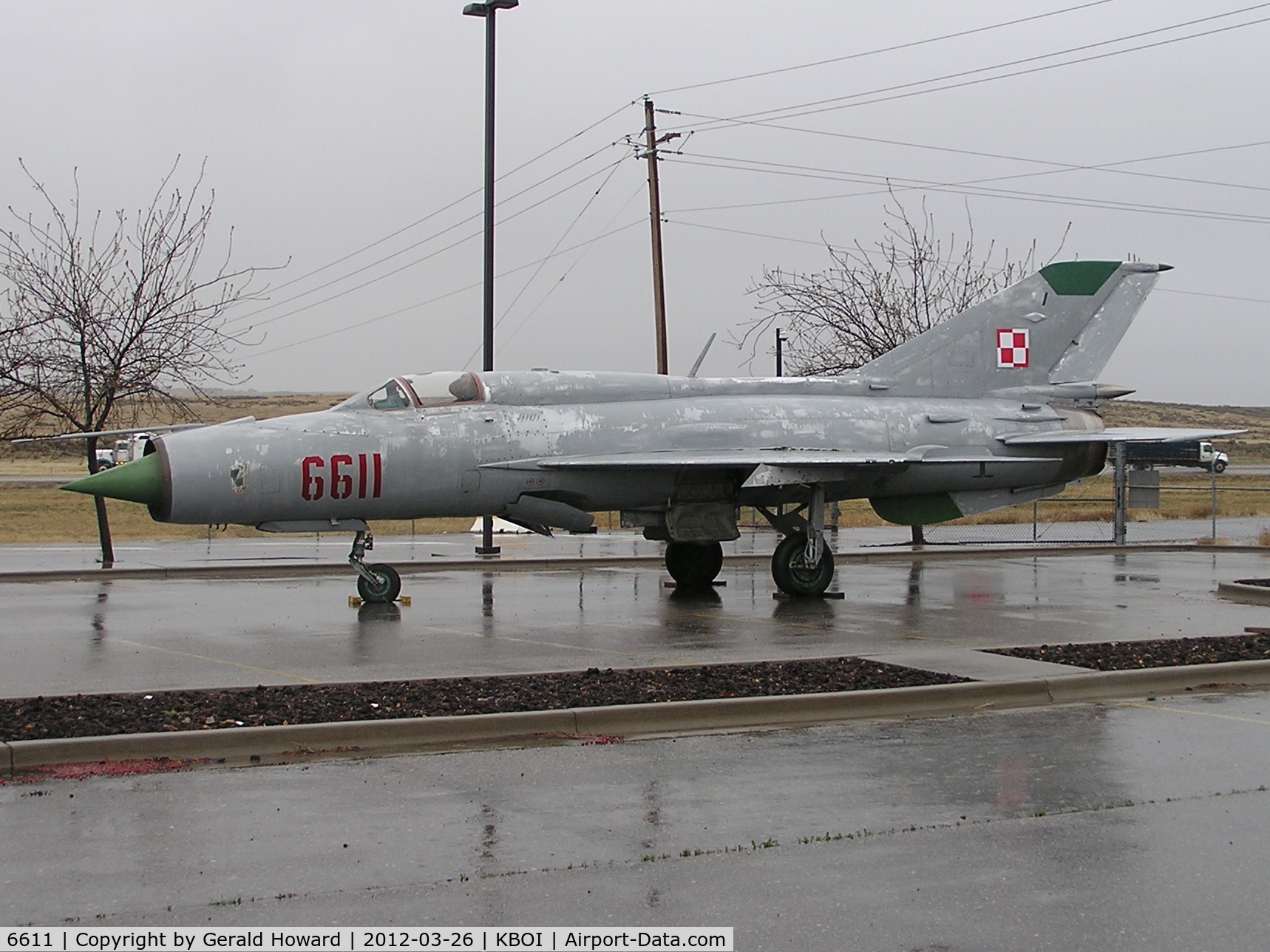 6611, 2000 Mikoyan-Gurevich MiG-21PFM C/N 94A6611, Arrival day at Gowen Field Military Museum. Located on airport's SW corner.