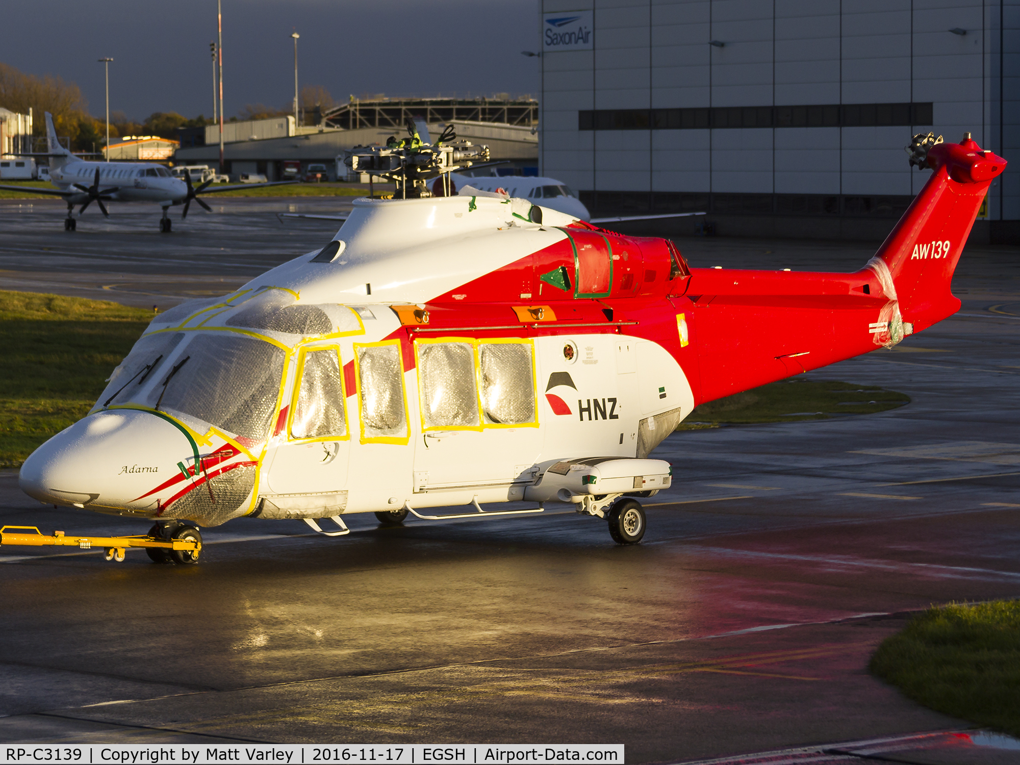 RP-C3139, 2013 AgustaWestland AW-139 C/N 41354, Being towed to the CHC hangar @ NWI after arriving on the back of a low loader lorry....