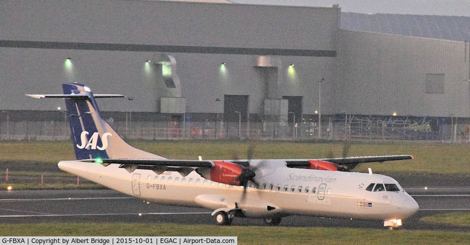 G-FBXA, 2015 ATR 72-212A C/N 1260, Twenty minutes after sunset, flybe ATR 72 G-FBXA in SAS livery, arriving at Belfast City on a training flight.