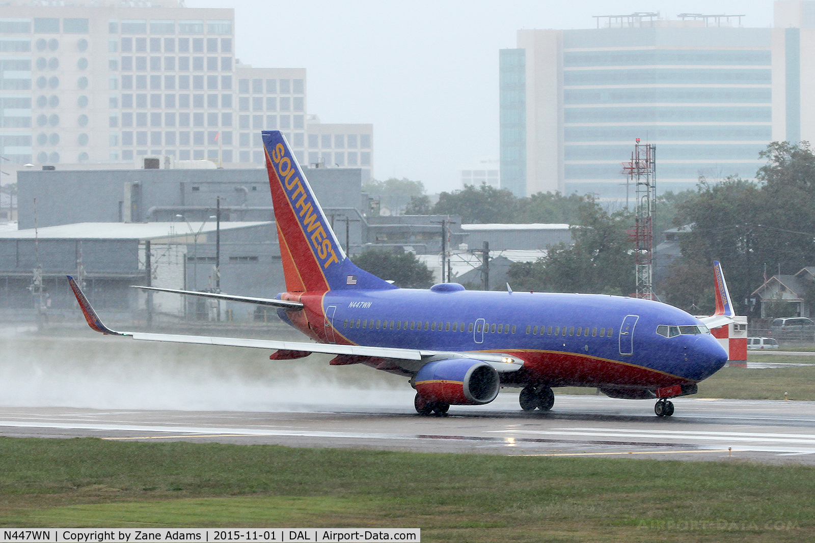 N447WN, 2003 Boeing 737-7H4 C/N 33720, Departing Dallas Love Field in the rain.