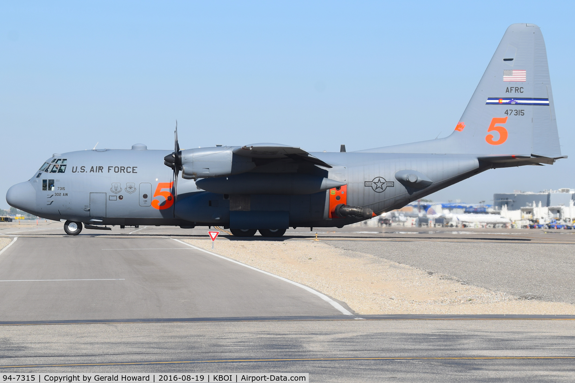 94-7315, Lockheed C-130H C/N 382-5389, Tanker 5 taxing from NIFC ramp to RWY 28R. Equipped with MAFFS. 302nd Air Wing – Peterson AFB, CO