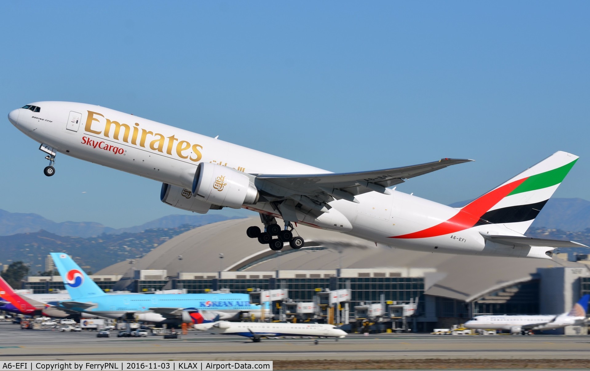 A6-EFI, 2012 Boeing 777-F1H C/N 35609, Emirates B772F departing LAX