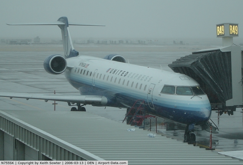 N755SK, 2005 Bombardier CRJ-700 (CL-600-2C10) Regional Jet C/N 10220, Parked on stand at Denver