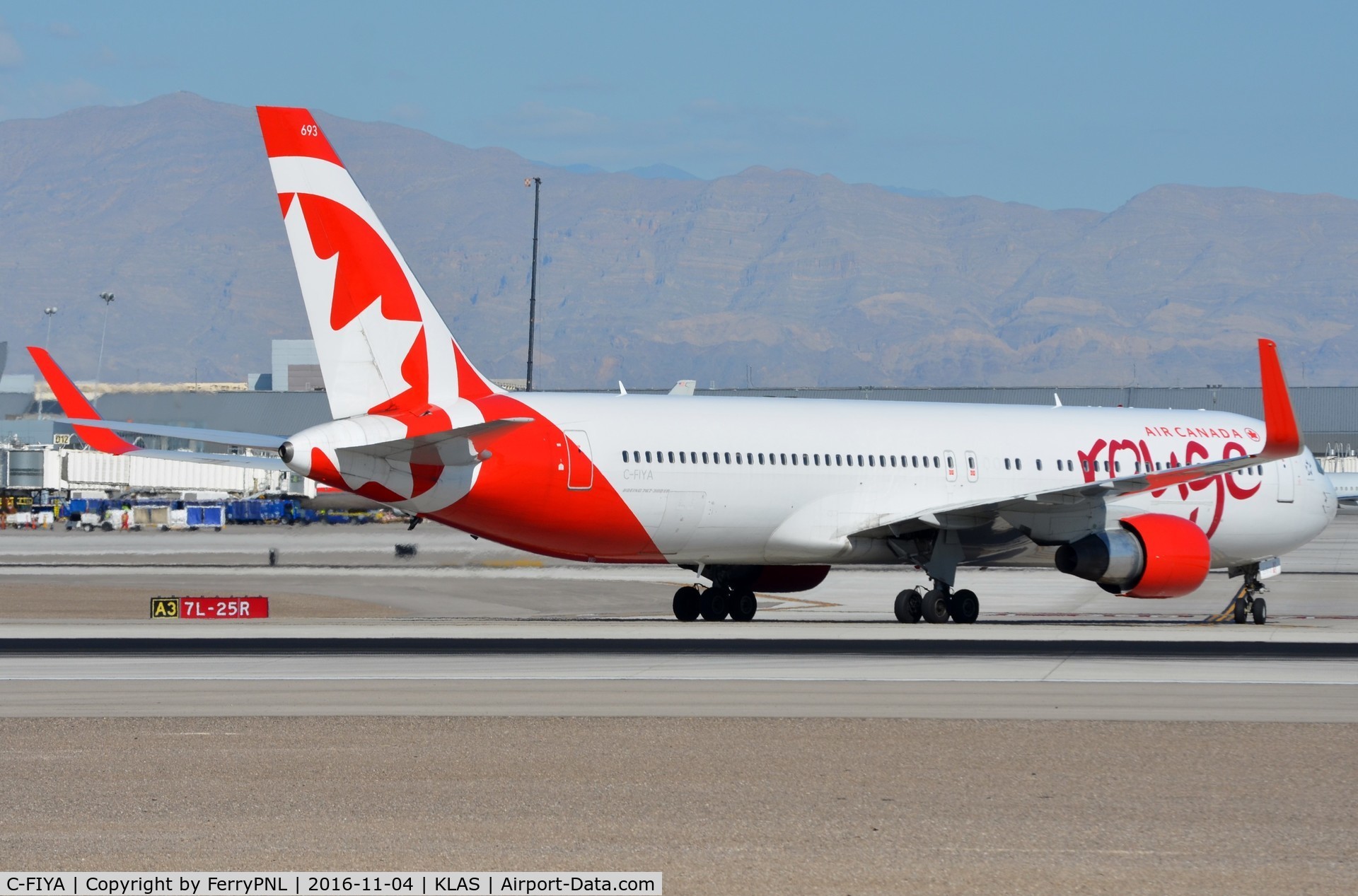 C-FIYA, 2002 Boeing 767-33A C/N 33421, Rouge B763 about to cross the runway.