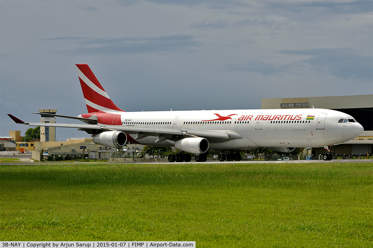 3B-NAY, 1996 Airbus A340-313 C/N 152, 'Cardinal' taxiing out for departure from rwy 14 in the morning.
