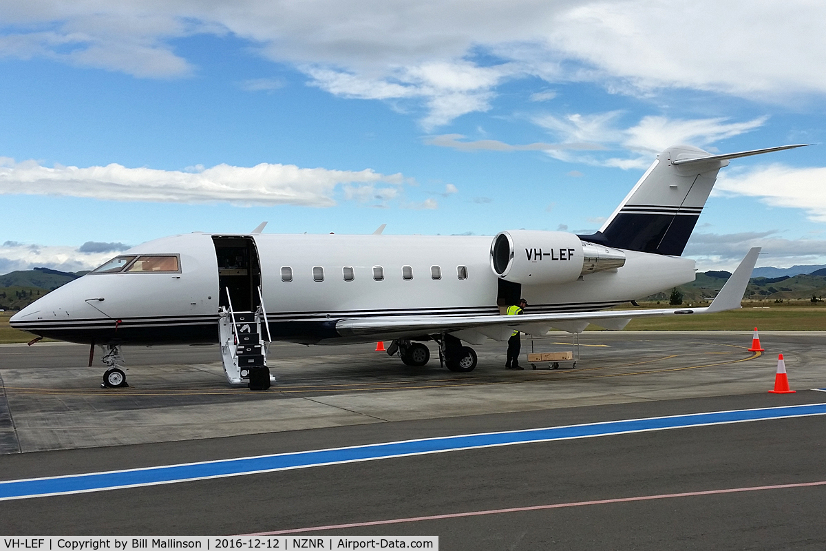 VH-LEF, 2005 Bombardier Challenger 604 (CL-600-2B16) C/N 5577, loading wine for an Aussie piss-up