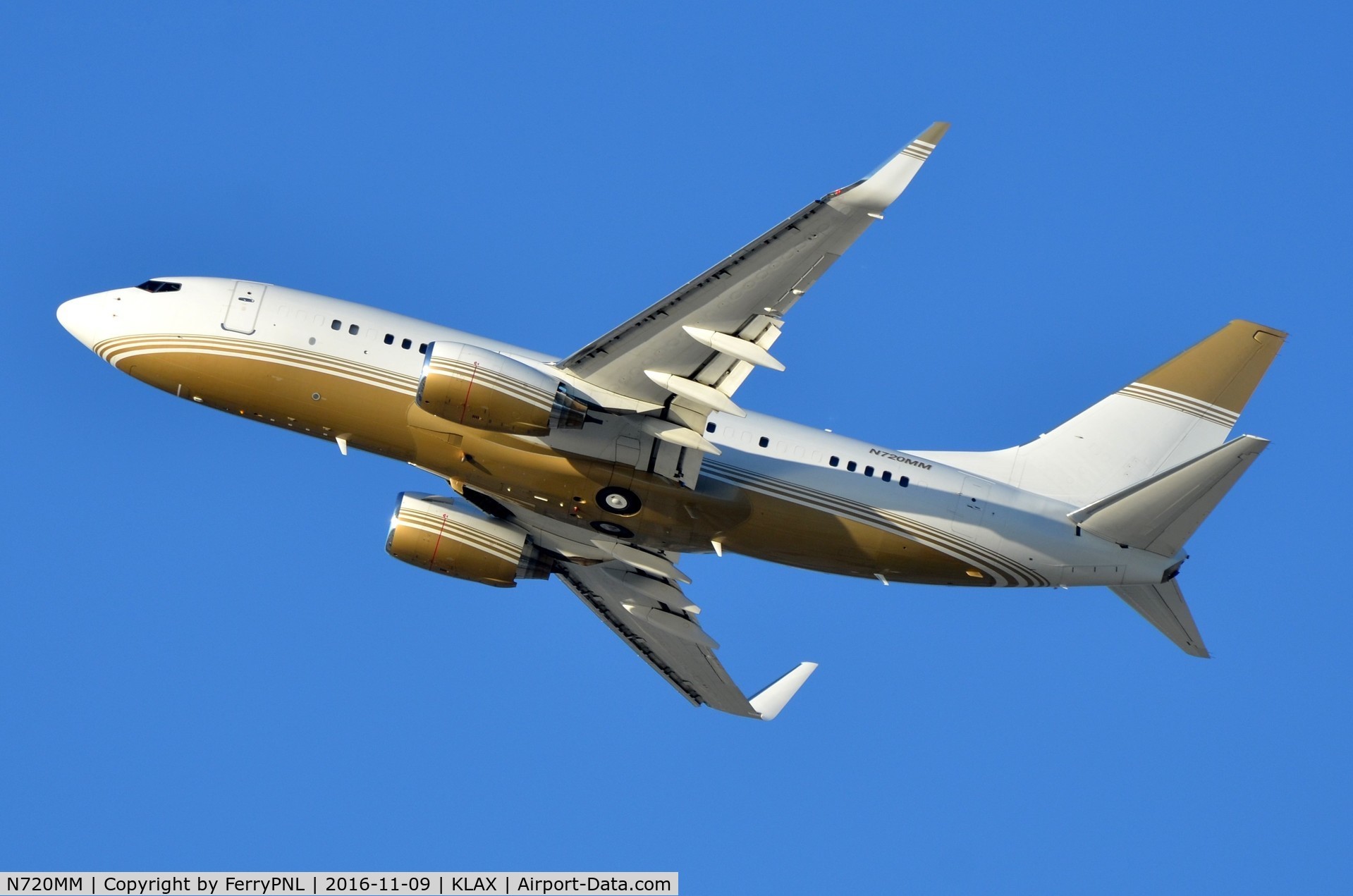 N720MM, 2001 Boeing 737-7ET C/N 33010, MGM's BBJ taking-off from LAX