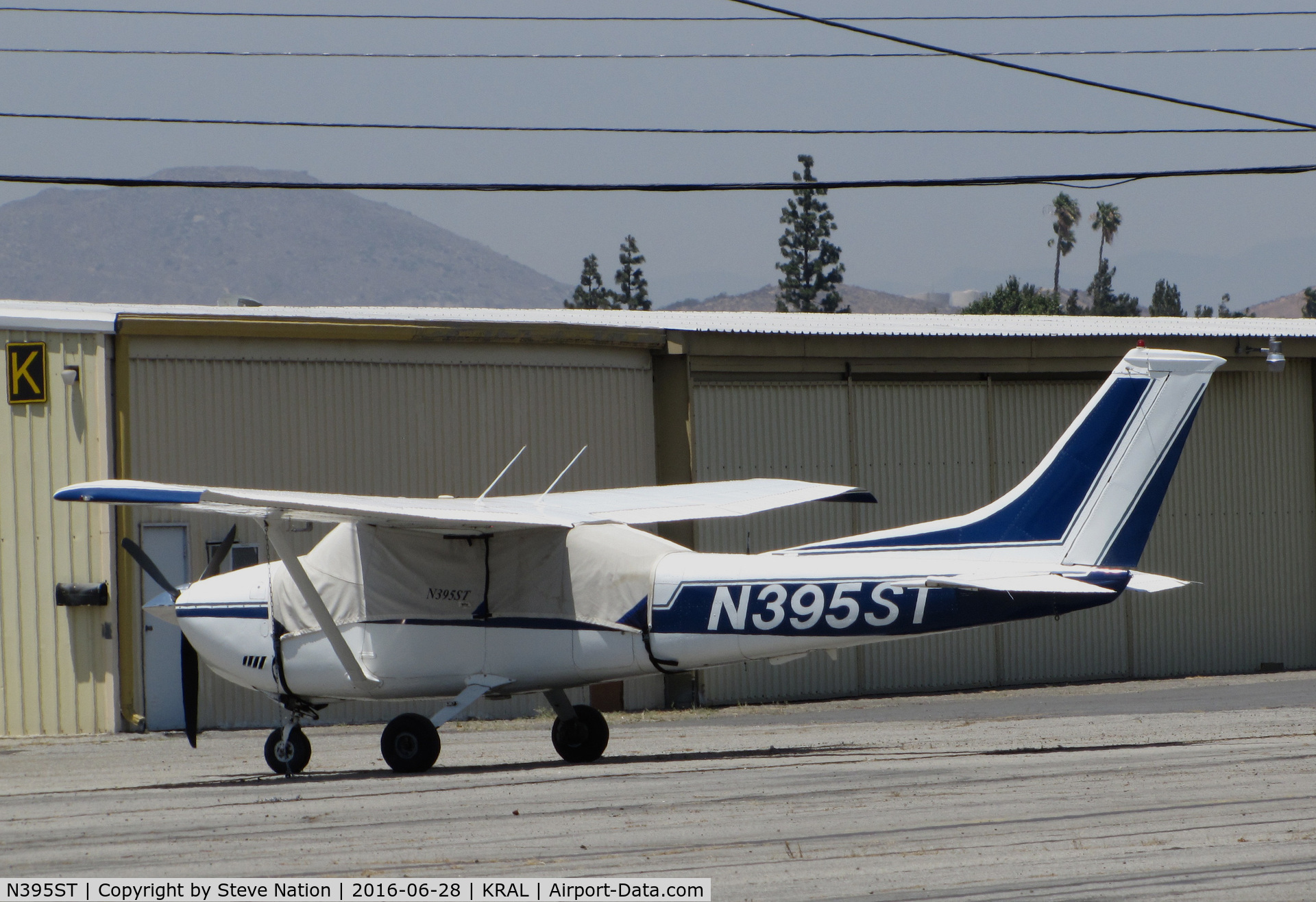 N395ST, 1973 Cessna 182P Skylane C/N 18262665, 1973 Cessna 182P Skylane with cockpit covered under 102F sun @ Riverside MAP, CA home base