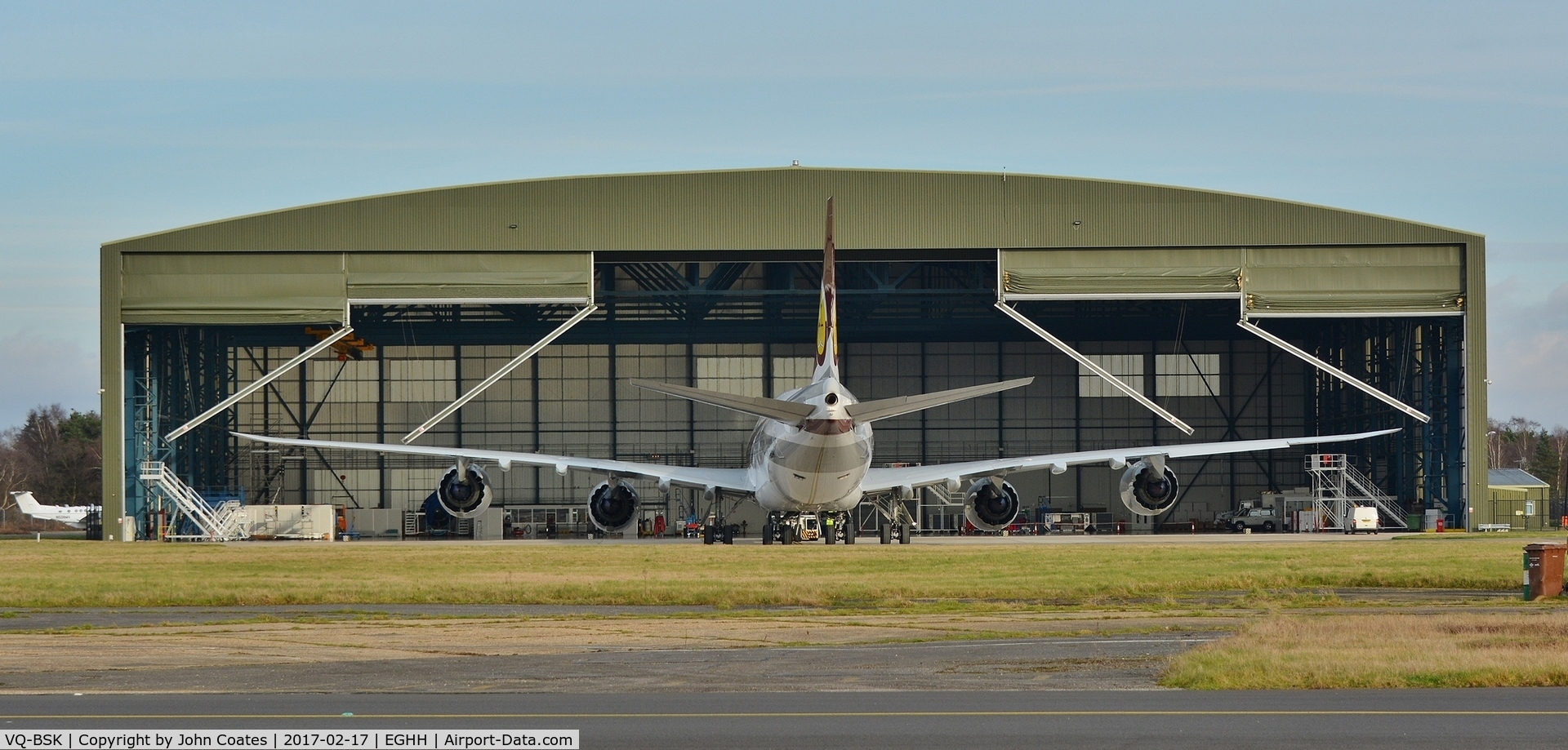 VQ-BSK, 2015 Boeing 747-8ZV BBJ C/N 42096, Hangar doors opening for this resident's return