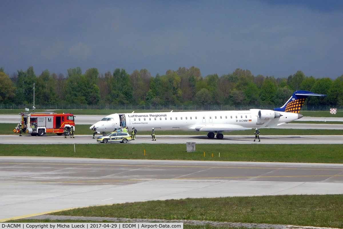 D-ACNM, 2010 Bombardier CRJ-900LR (CL-600-2D24) C/N 15253, Not sure what the incident was, but there were 4+ fire engines plus airport vehicles surrounding the aircraft, which stopped next to the active runway.
