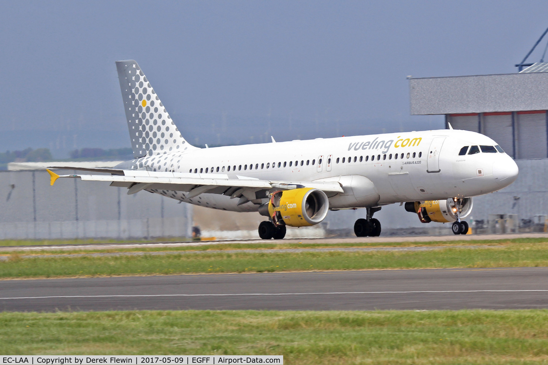 EC-LAA, 2006 Airbus A320-214 C/N 2678, A320-214, Vueling Airlines, callsign Vueling 83QL, previously F-WWIQ, EC-JPL, A6-ABZ , seen landing on runway 12 out of Alicante Spain.