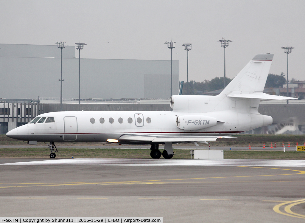 F-GXTM, 1986 Dassault Falcon 50 C/N 165, Taxiing to the General Aviation area...
