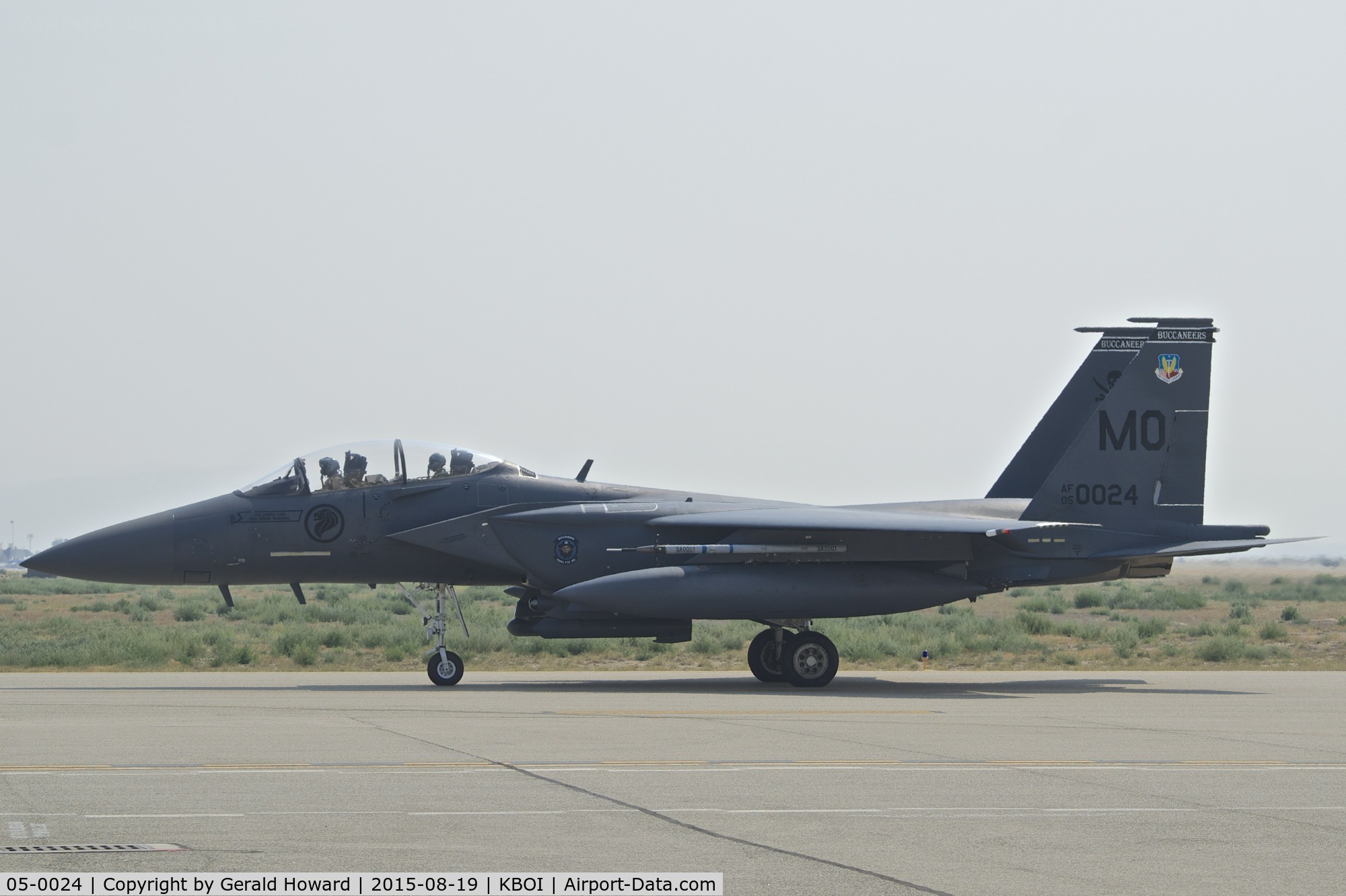 05-0024, 2005 Boeing F-15SG Strike Eagle C/N SG24, Waiting for clearance to RWY 10R on a very smoke filled day.  428th Fighter Sq. 
