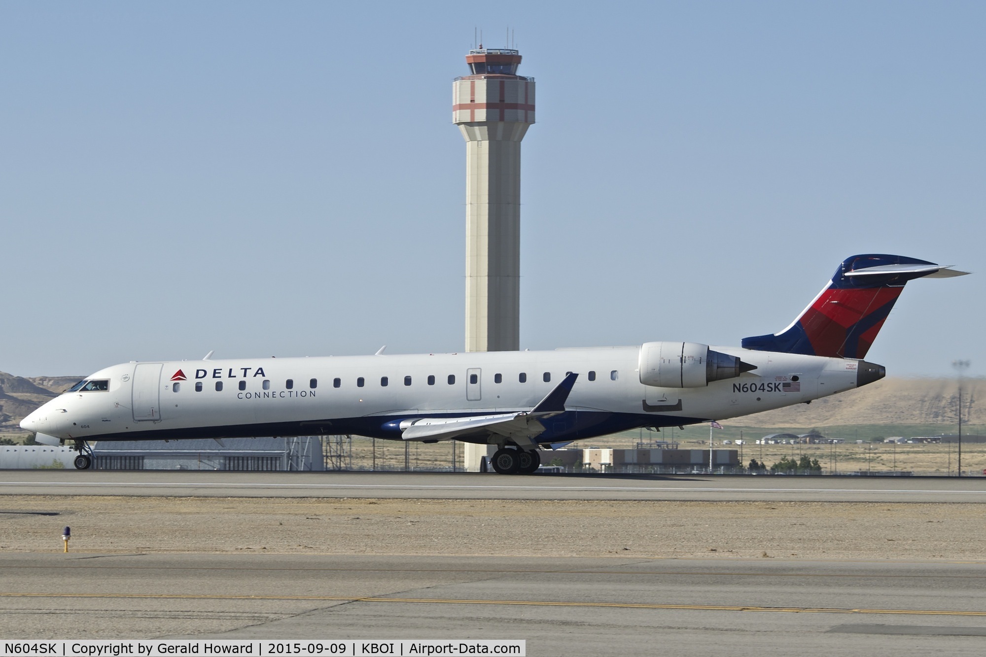 N604SK, 2006 Bombardier CRJ-702 (CL-600-2C10) Regional Jet C/N 10249, Landing roll out on RWY 10L.