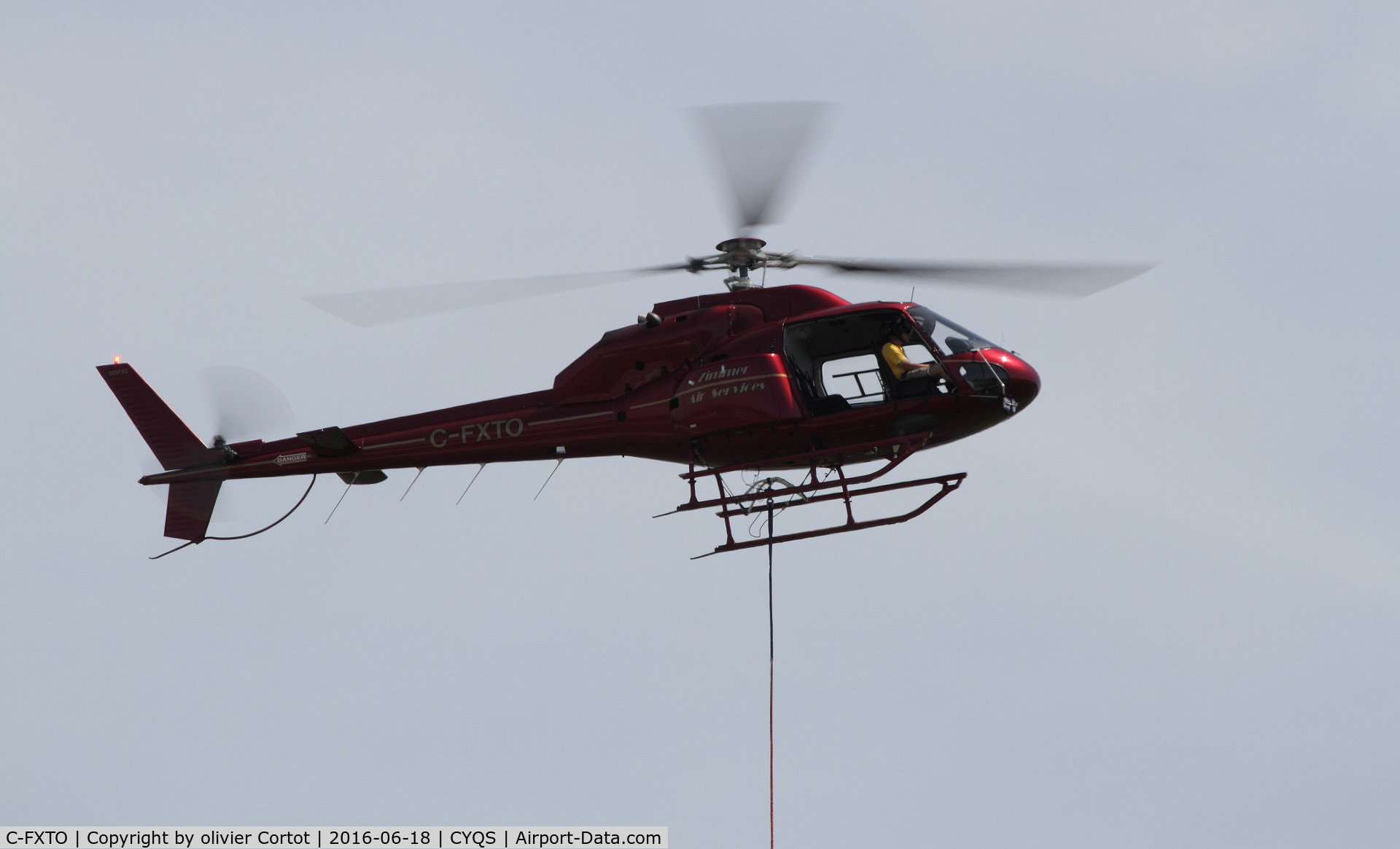 C-FXTO, 1981 Aerospatiale AS-355F-2 Ecureuil 2 C/N 5087, about to drop a car during the 2016 St Thomas airshow !