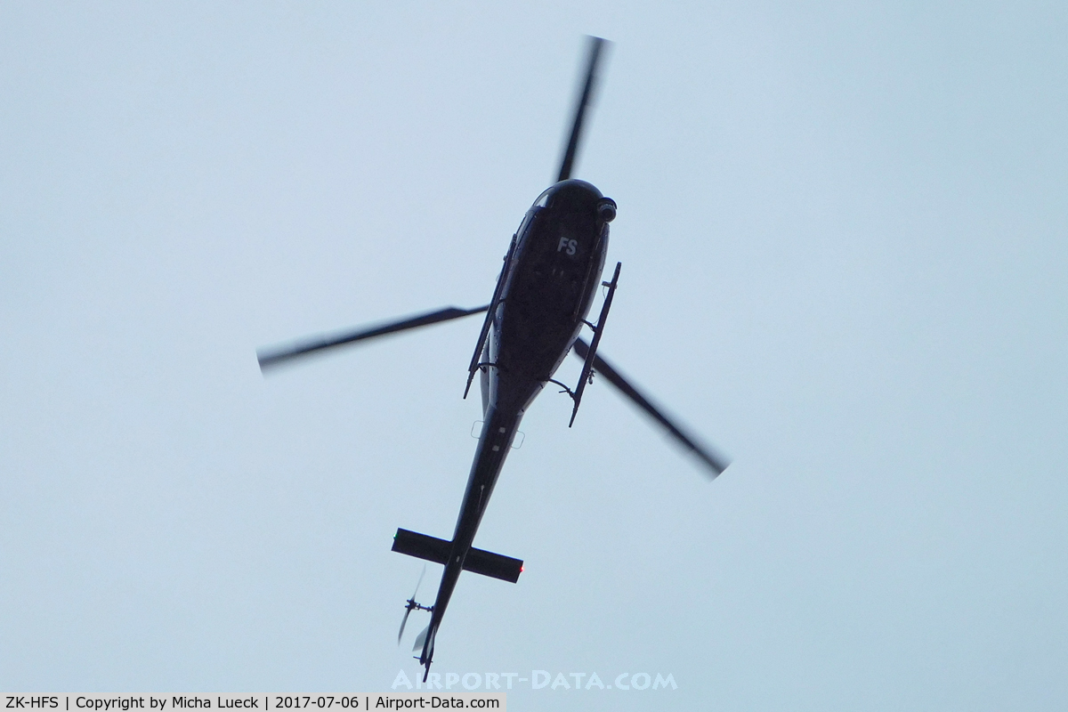 ZK-HFS, 1988 Eurocopter AS-355F-2 Ecureuil 2 C/N 5388, Over Auckland CBD, filming the America's Cup Parade