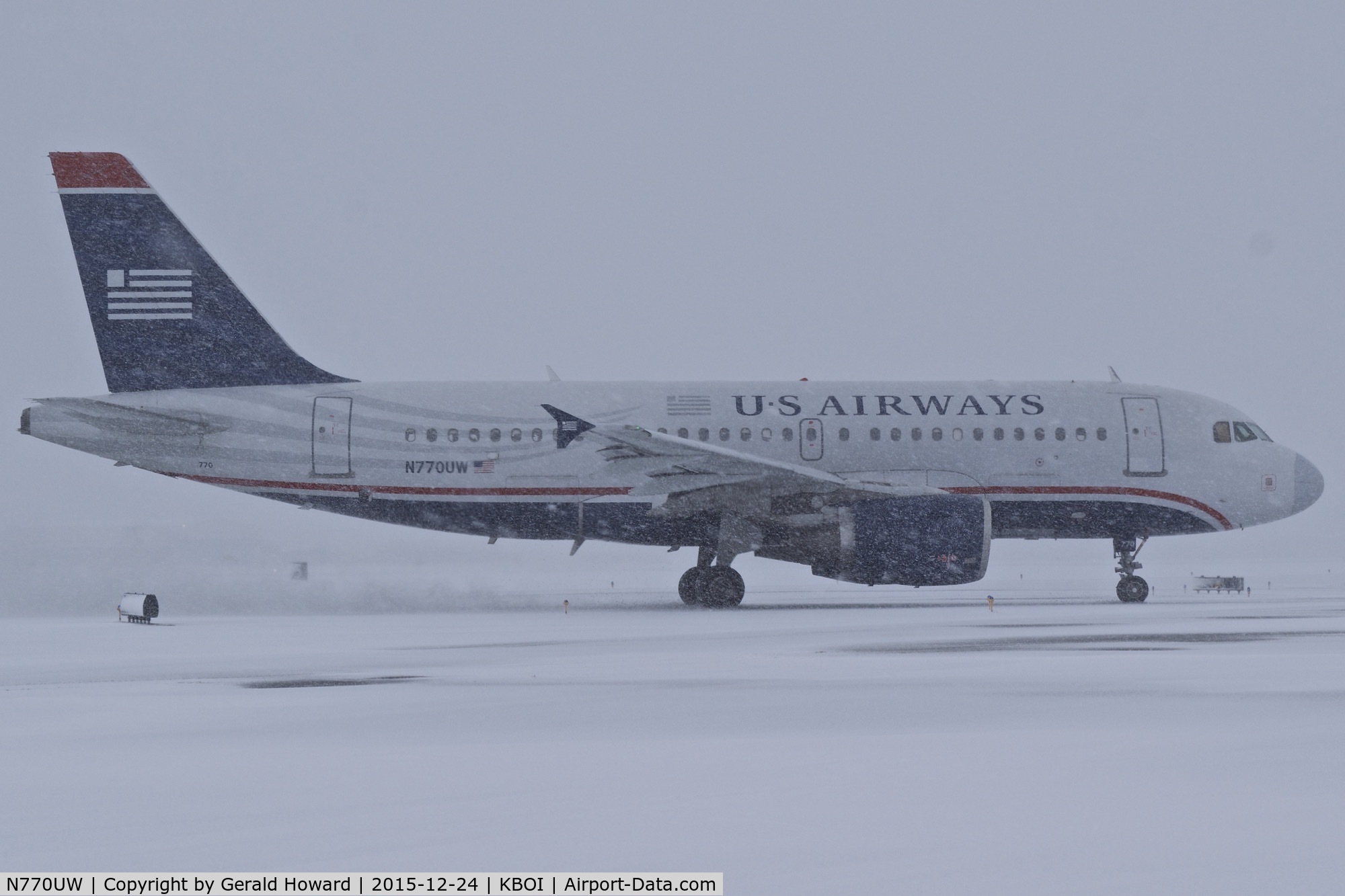 N770UW, 2000 Airbus A319-112 C/N 1393, Taxiing off the runway to the gate.