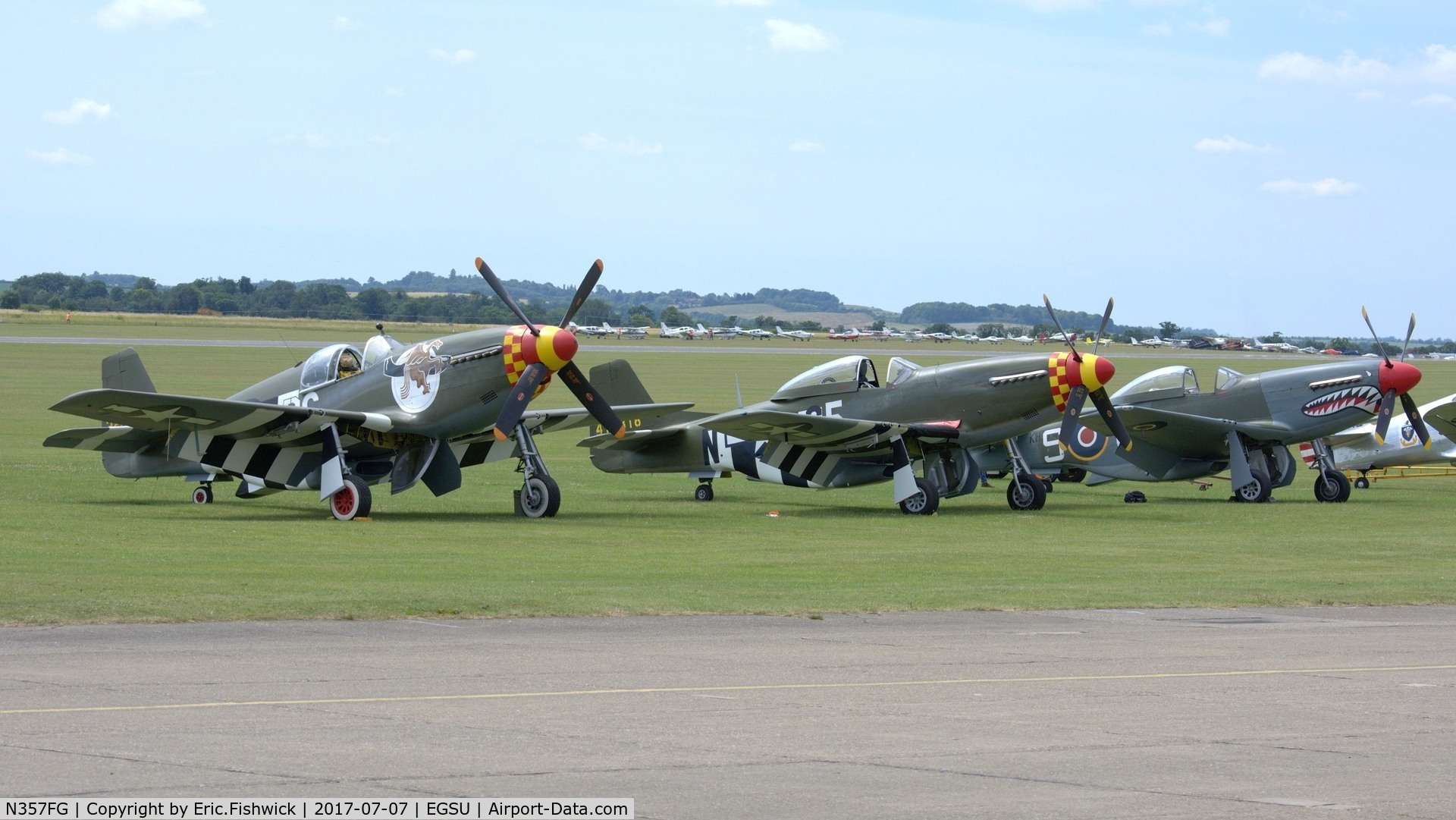 N357FG, 1944 North American P-51D C/N 44-12139, 5. Trio of visiting Mustangs on the eve of The Flying Legends Airshow, July 2017.