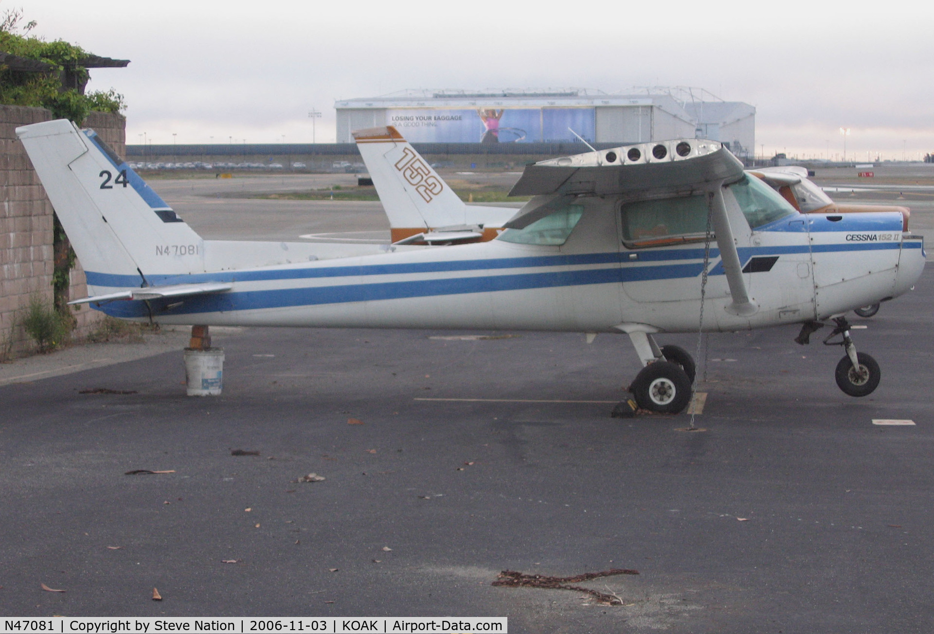 N47081, 1979 Cessna 152 C/N 15283168, Rather forlorn 1979 Cessna 152 minus engine (fleet # 24) @ Oakland International Airport, CA