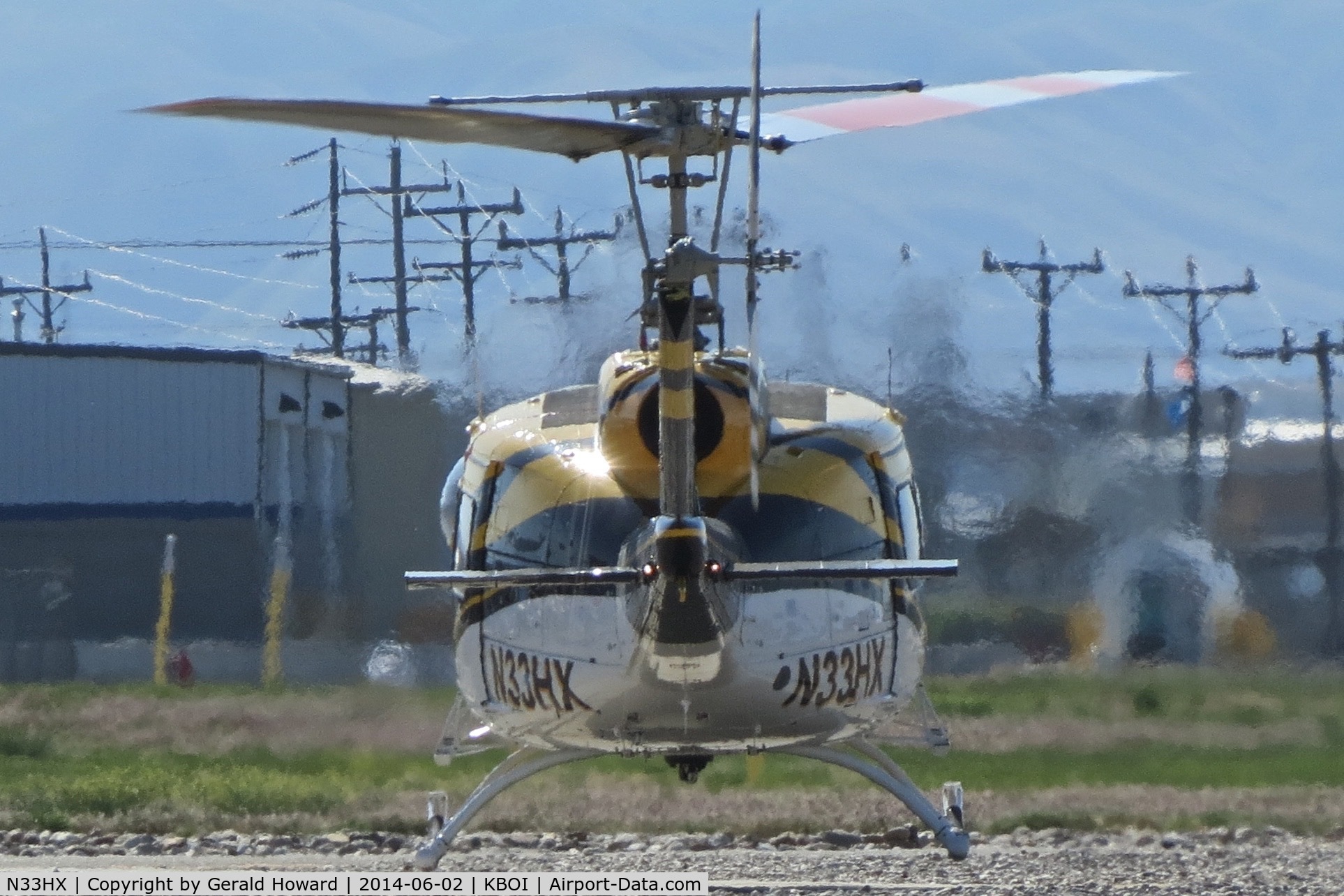 N33HX, 1976 Bell 205A-1 C/N 30235, Practice in the northeast field.