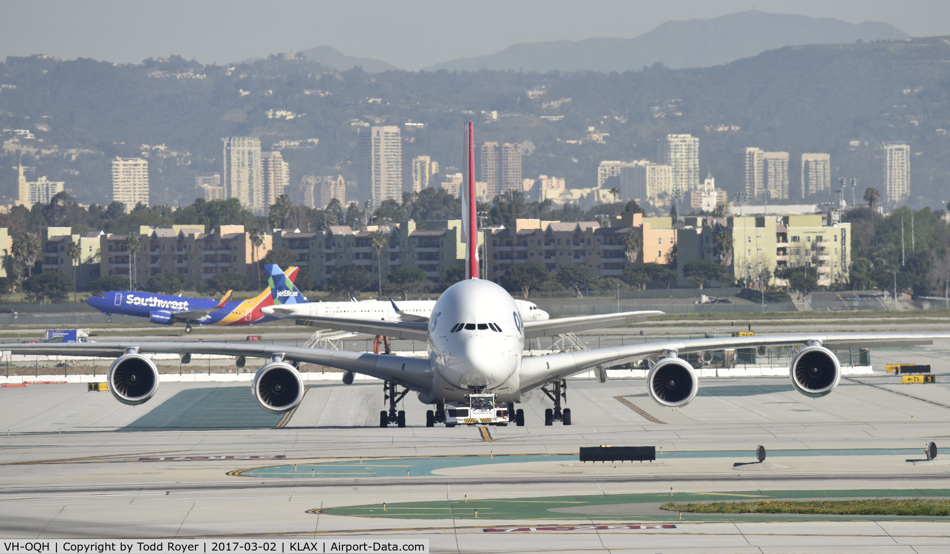 VH-OQH, 2009 Airbus A380-842 C/N 050, Getting towed to parking at LAX