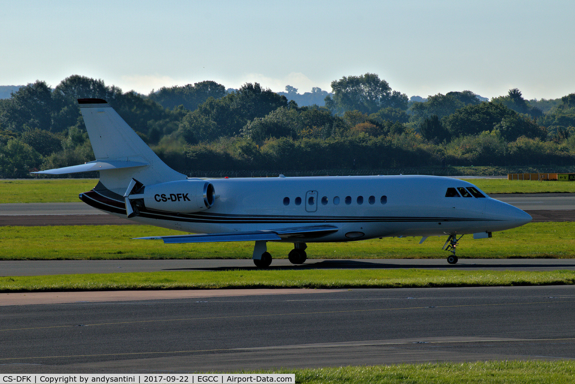 CS-DFK, 2006 Dassault Falcon 2000EX C/N 65, just left runway [23R] now taxing in to the [FBO exc ramp] at egcc uk.