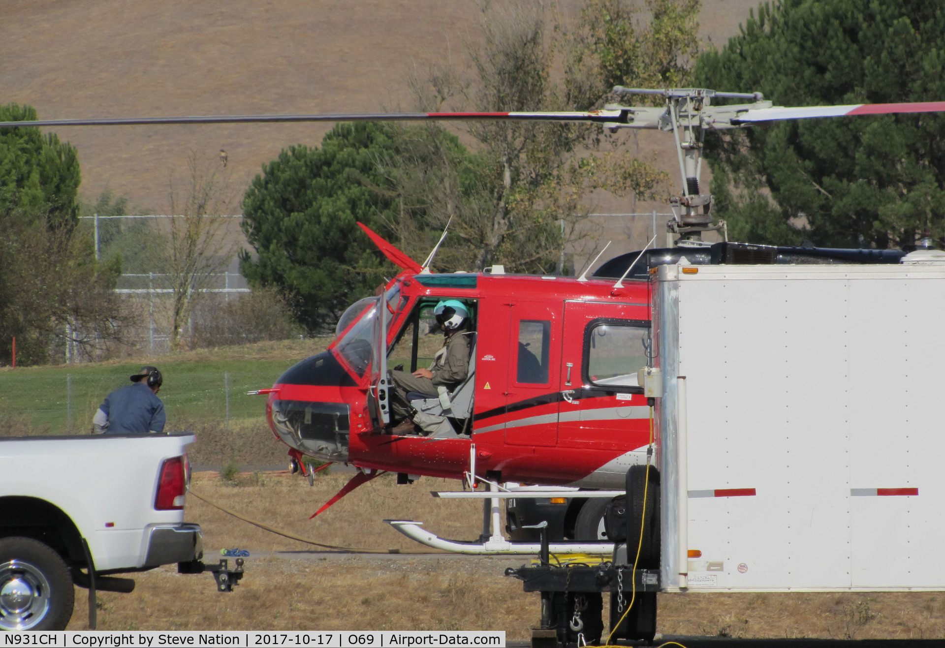 N931CH, 1972 Bell 205A-1 C/N 30110, Pilot of Heligroup Fire LLC (Missoula, MT) shutting down 1972 Bell 205A-1 after returning to Petaluma Municipal Airport, CA temporary home base from making water drops on the devastating October 2017 Northern California wildfires