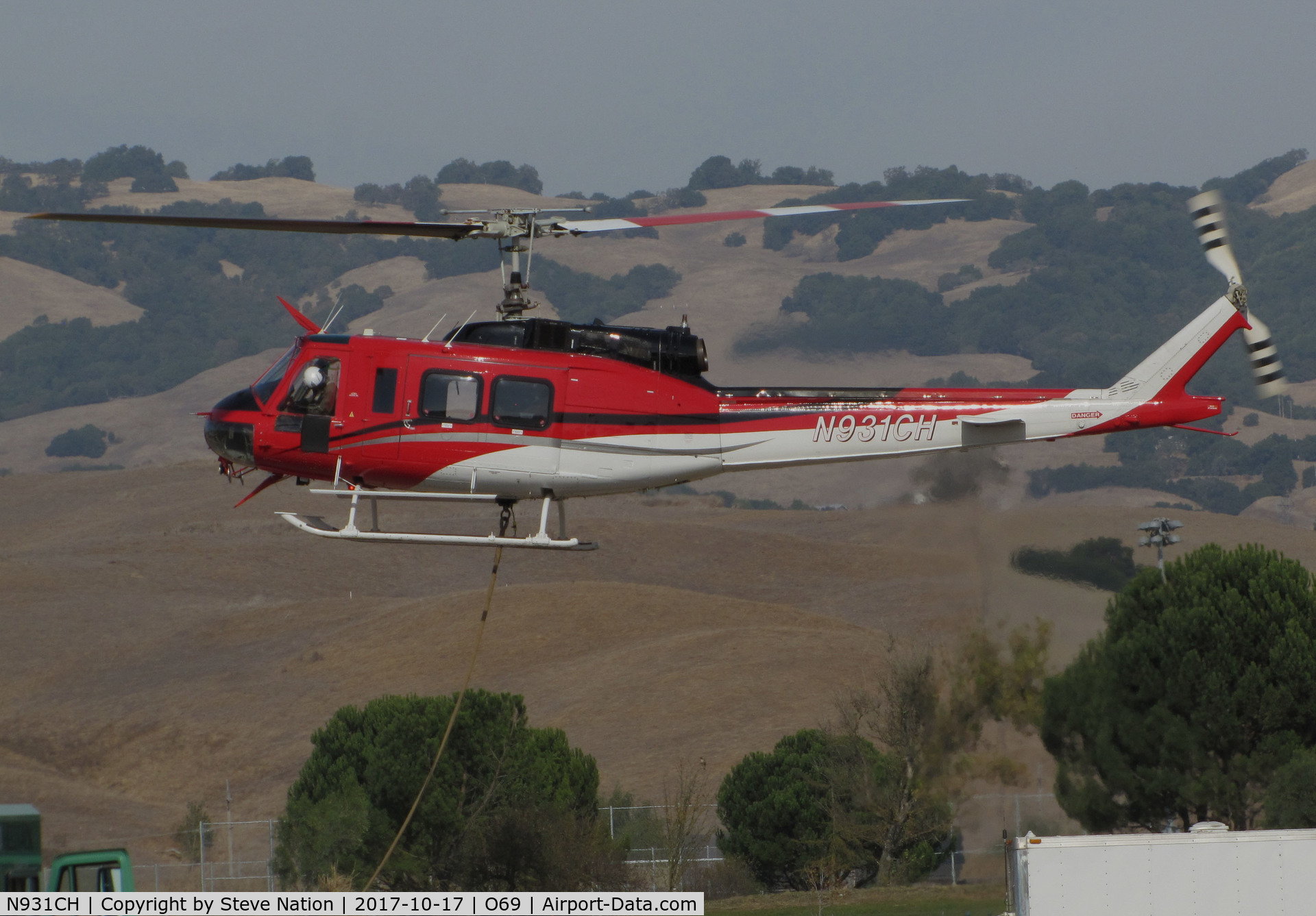 N931CH, 1972 Bell 205A-1 C/N 30110, Heligroup Fire LLC (Missoula, MT) 1972 Bell 205A-1 ready to land at Petaluma Municipal Airport, CA temporary home base from making water drops on the devastating October 2017 Northern California wildfires