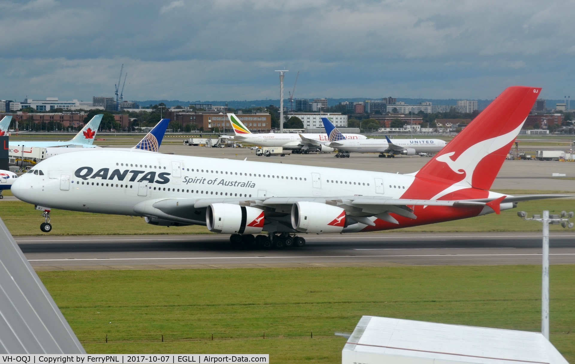 VH-OQJ, 2010 Airbus A380-842 C/N 062, Qantas A388 touching down in LHR