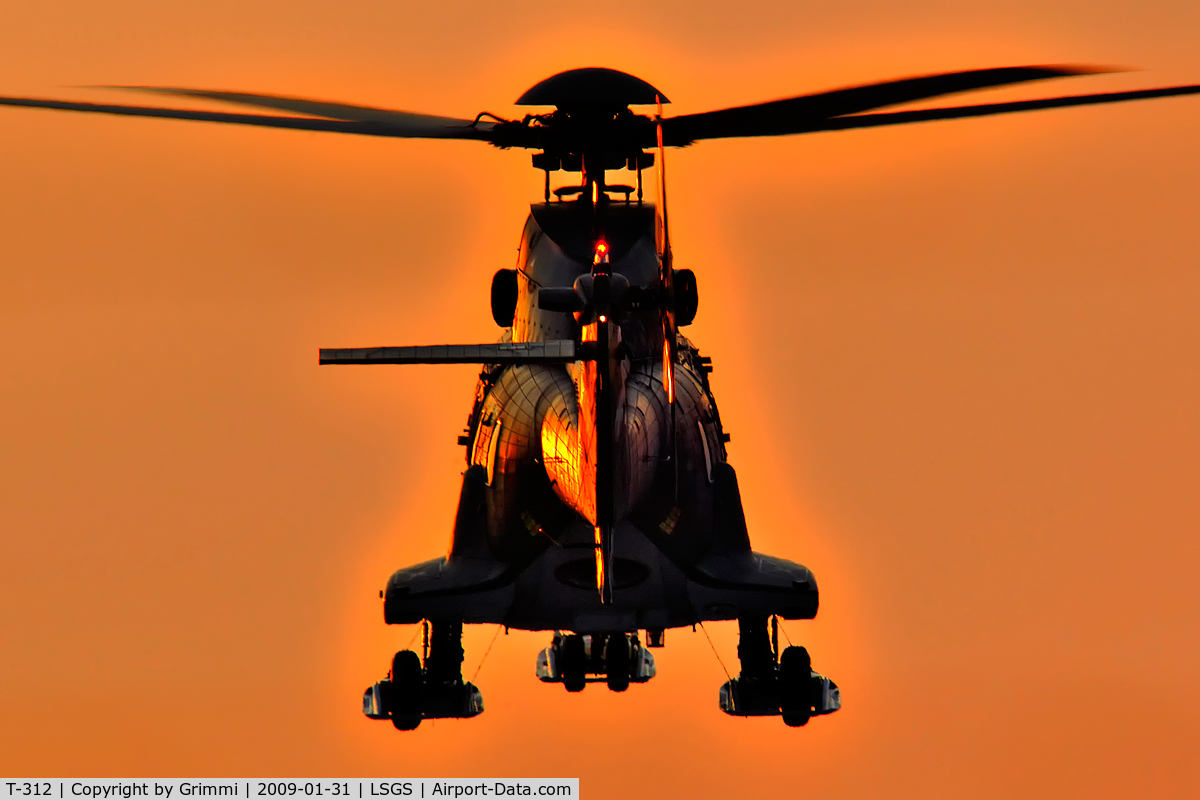T-312, 1987 Aerospatiale TH89 Super Puma (AS-332M1) C/N 2224, This Super Puma arrived with the last climpses of light - WEF 2009