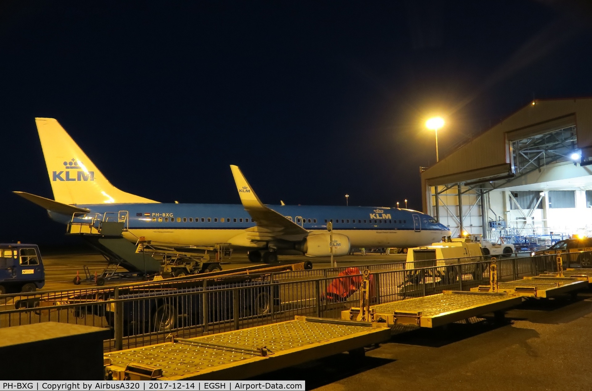 PH-BXG, 2000 Boeing 737-8K2 C/N 30357, Towing a 737 into Hangar 3 at Norwich across 2 stands with all  the airport equipment parked in the way