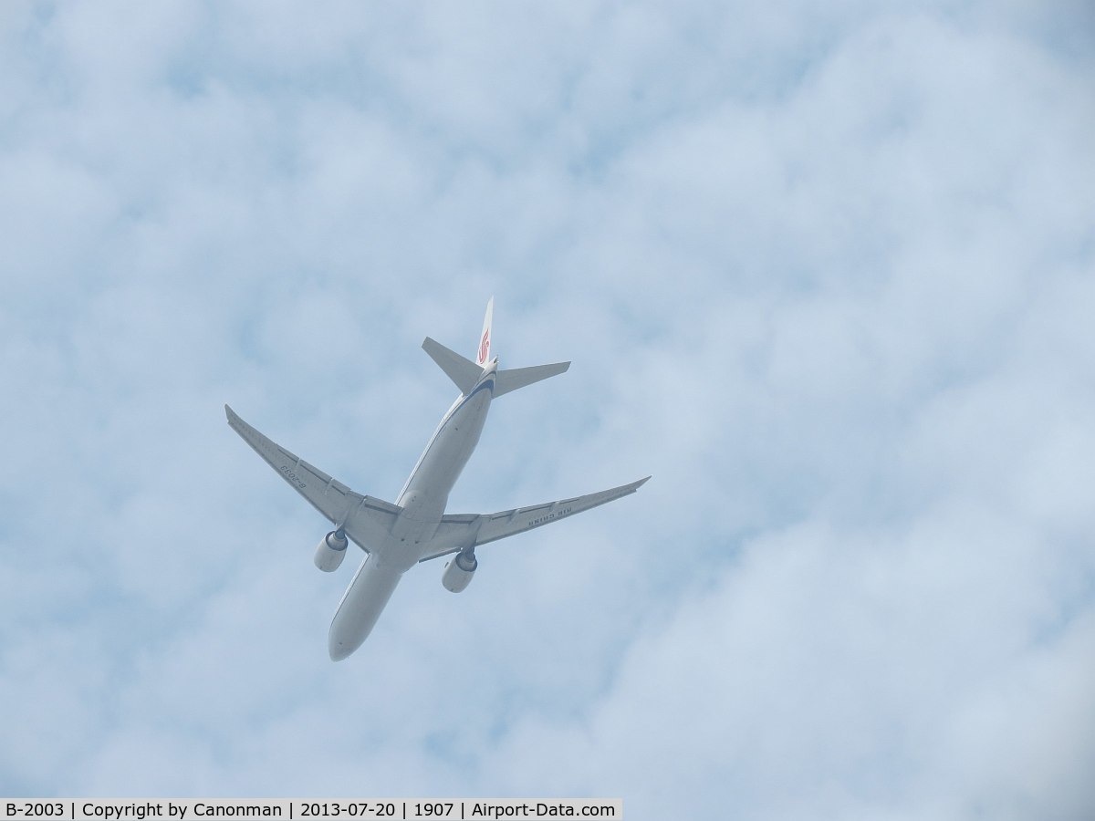 B-2003, 2014 Boeing 777-39P/ER C/N 43270, Landing