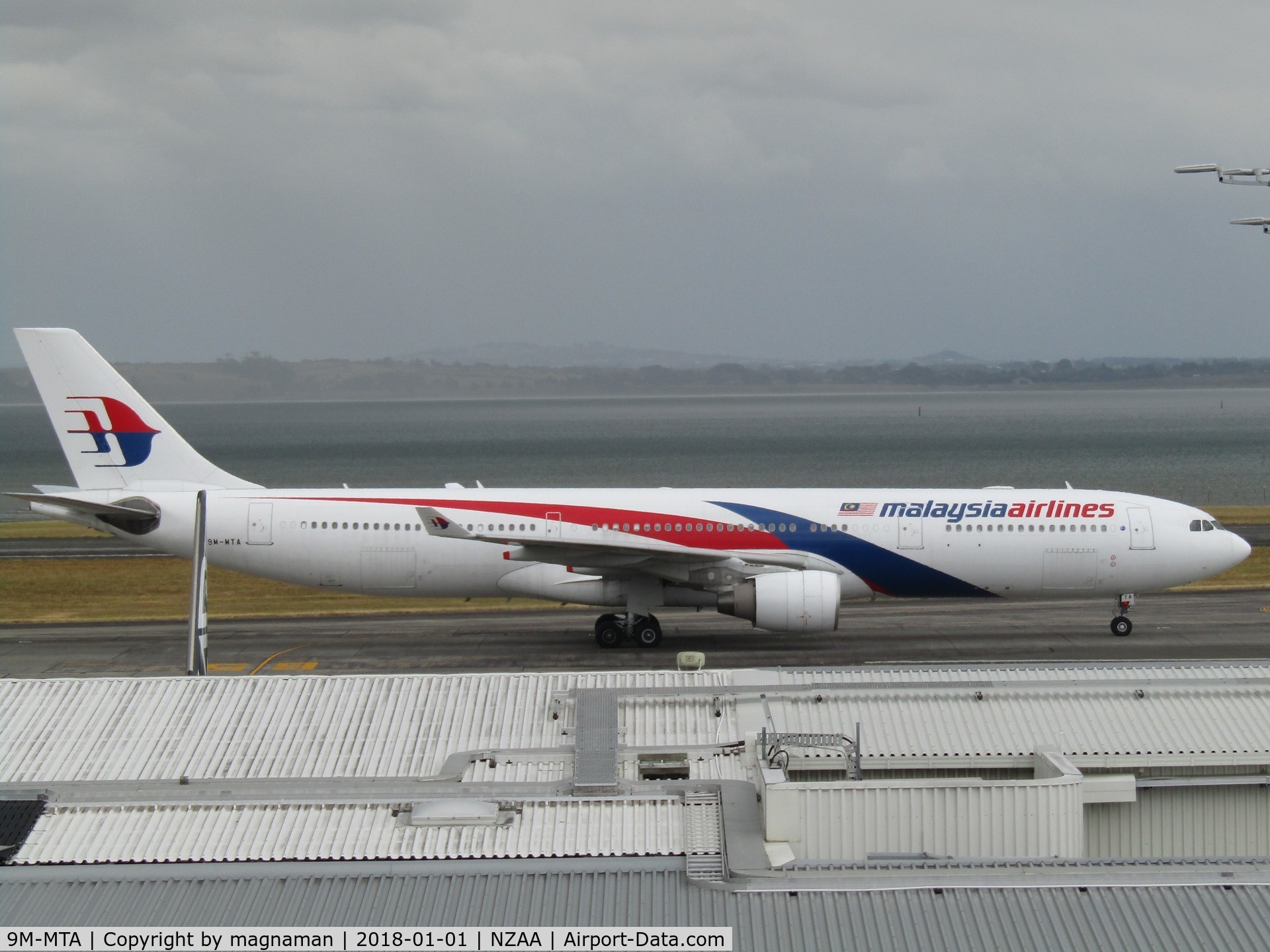 9M-MTA, 2011 Airbus A330-323 C/N 1209, taxying to stand