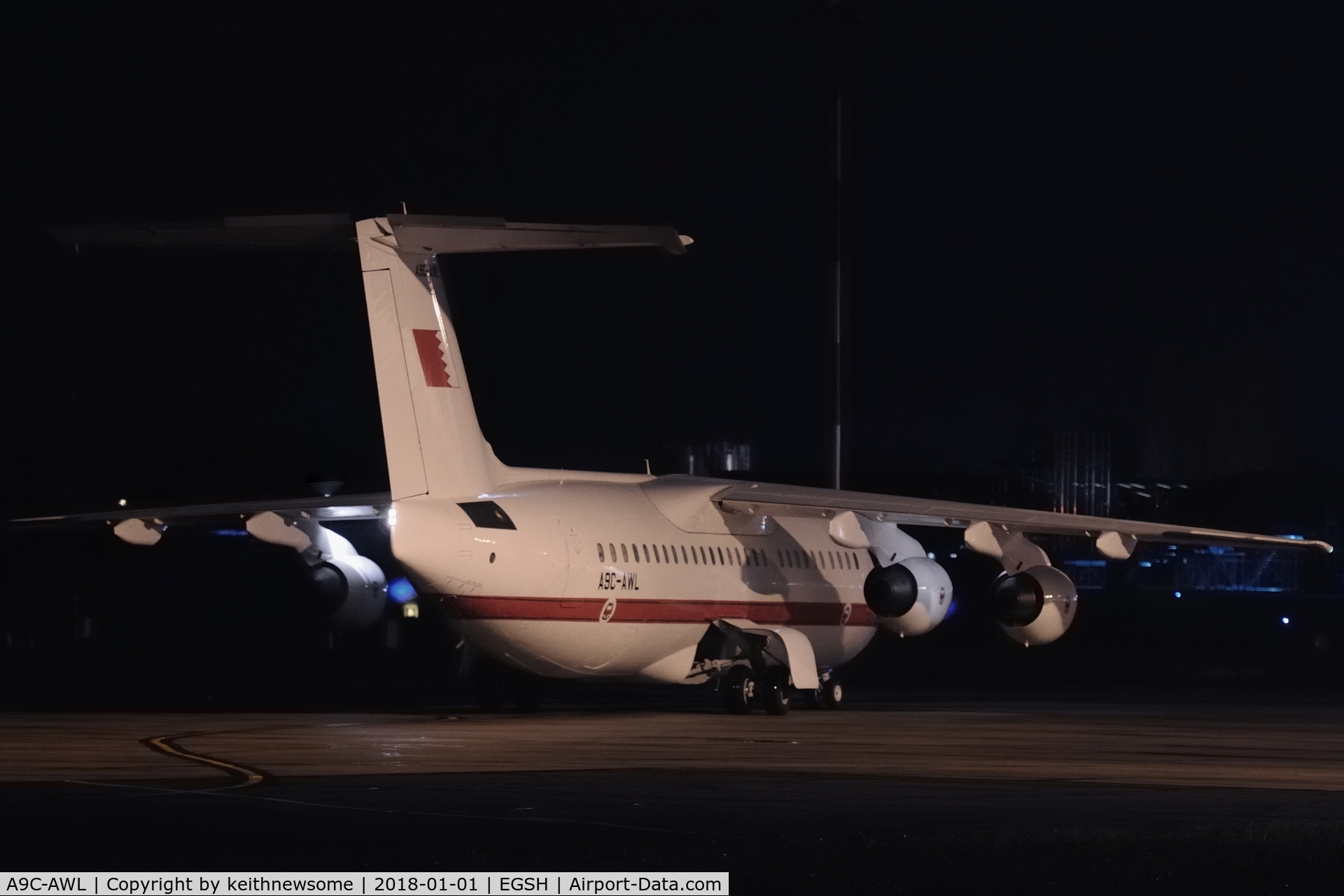 A9C-AWL, 2001 British Aerospace Avro 146-RJ100 C/N E3386, Arriving in darkness.