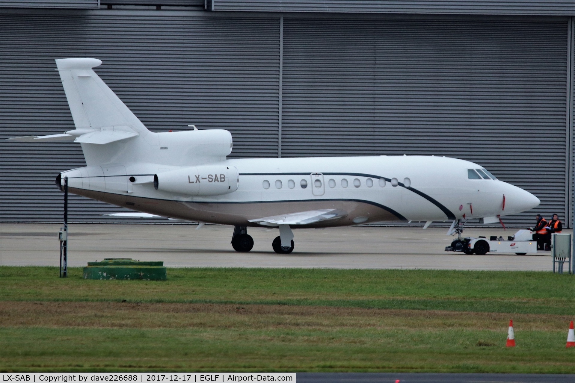 LX-SAB, 2008 Dassault Falcon 900DX C/N 619, LX SAB being towed out of hanger at Farnborough
