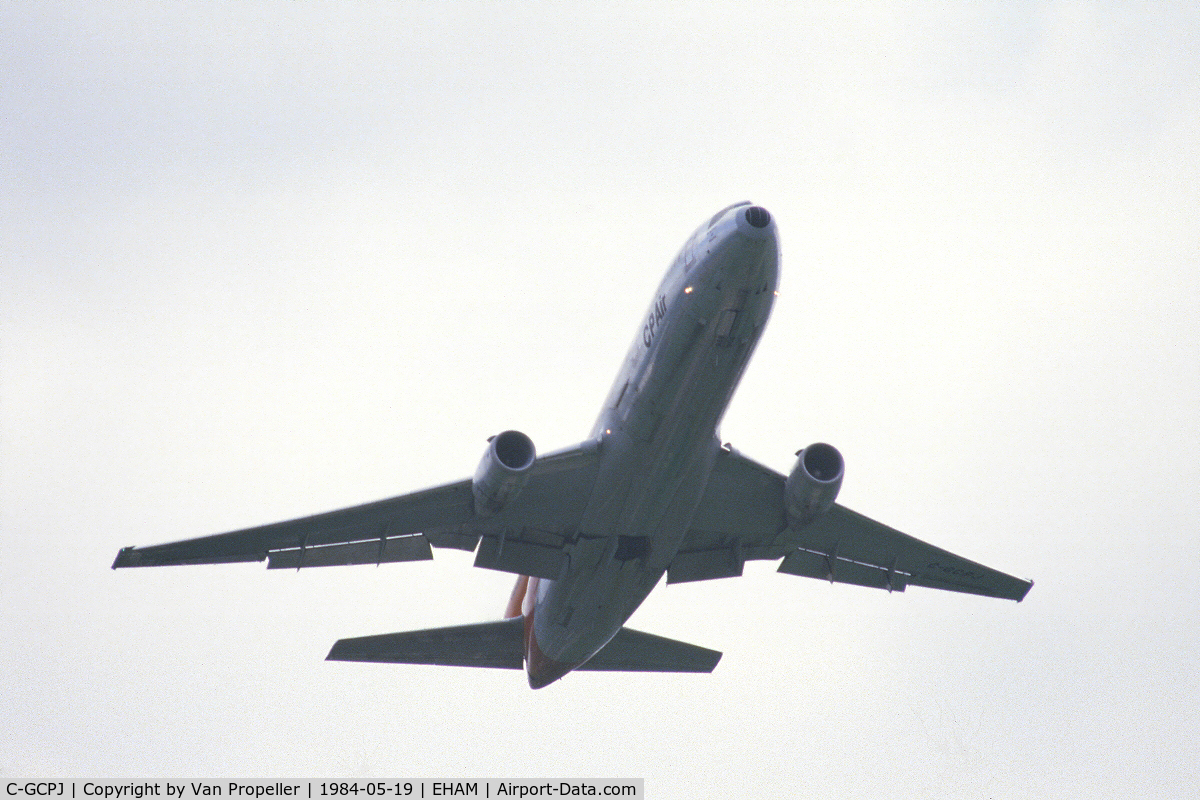 C-GCPJ, 1979 McDonnell Douglas DC-10-30 C/N 46991, CP Air DC-10-30 climbing away from Schiphol airport, the Netherlands, 1984