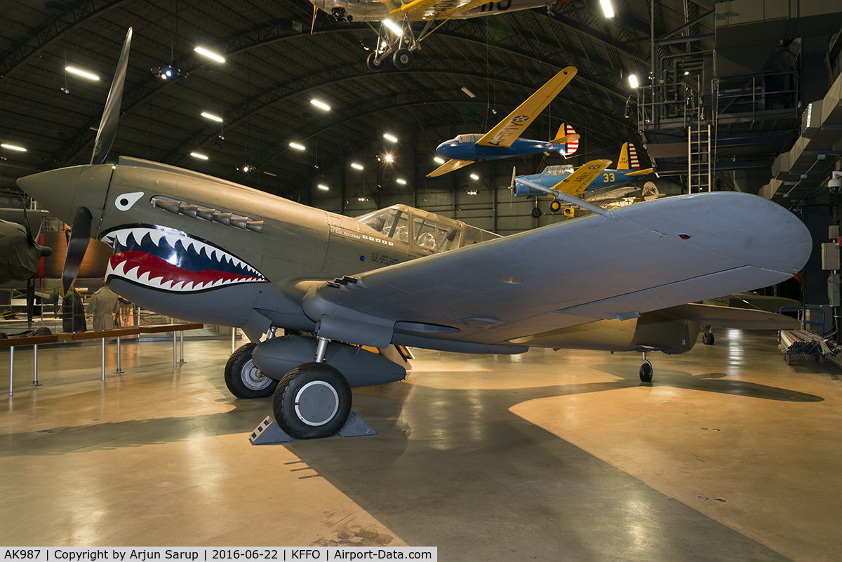 AK987, 1942 Curtiss P-40E Kittyhawk 1A C/N 18731, On display at the National Museum of the U.S. Air Force.  This former RCAF P-40 is painted to represent the aircraft flown by Col. Bruce Holloway of the Flying Tigers and its successor, the 23rd Fighter Group.