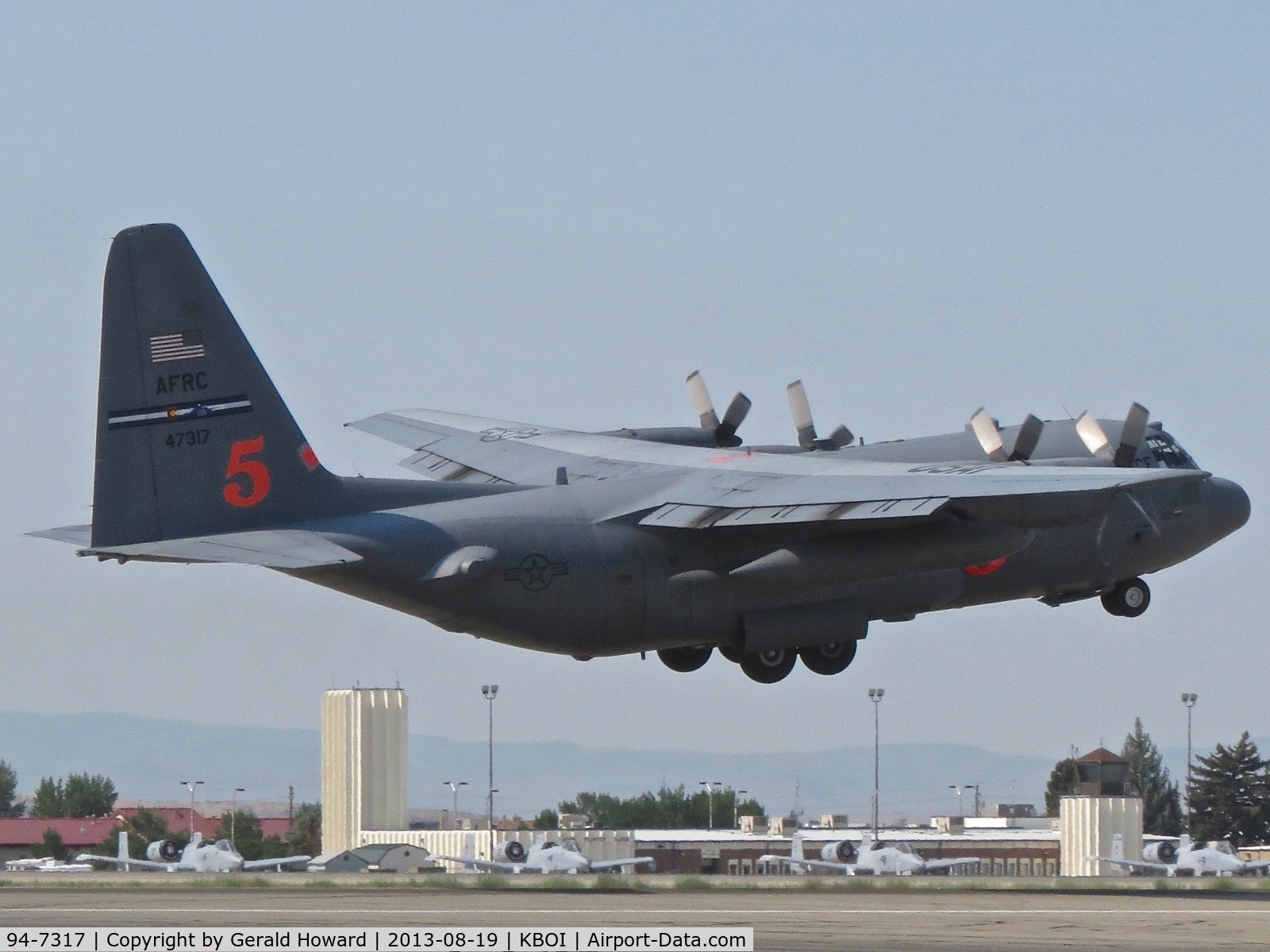 94-7317, 1994 Lockheed C-130H Hercules C/N 382-5391, Departing RWY 28R. 302nd Air Wing – AFRC  Peterson AFB, CO