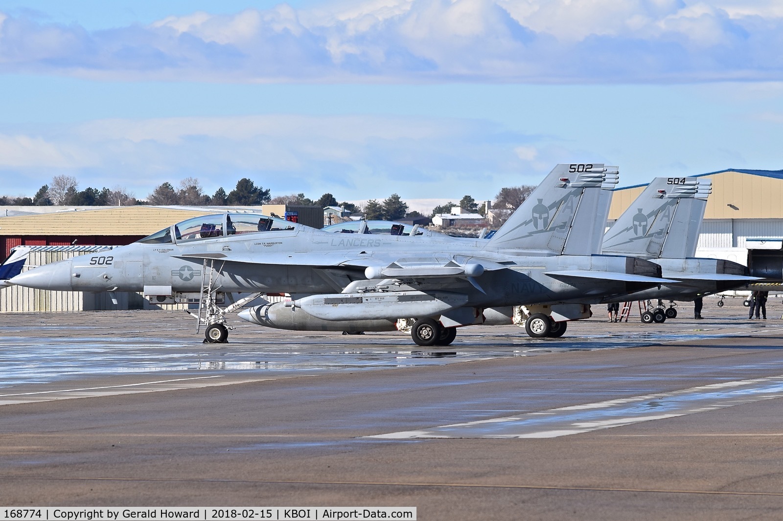 168774, Boeing EA-18G Growler C/N G-88, Two EA-18Gs from VAQ-131 “Lancers”, CVN-77, USS George H.W. Bush parked on the south GA ramp for a fuel stop.