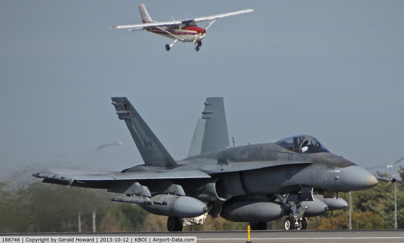 188746, McDonnell Douglas CF-188A Hornet C/N 0329/A273, 409 Squadron, Cold Lake, Canada.  Taking off on RWY 10R. The Cessna is for 10L.