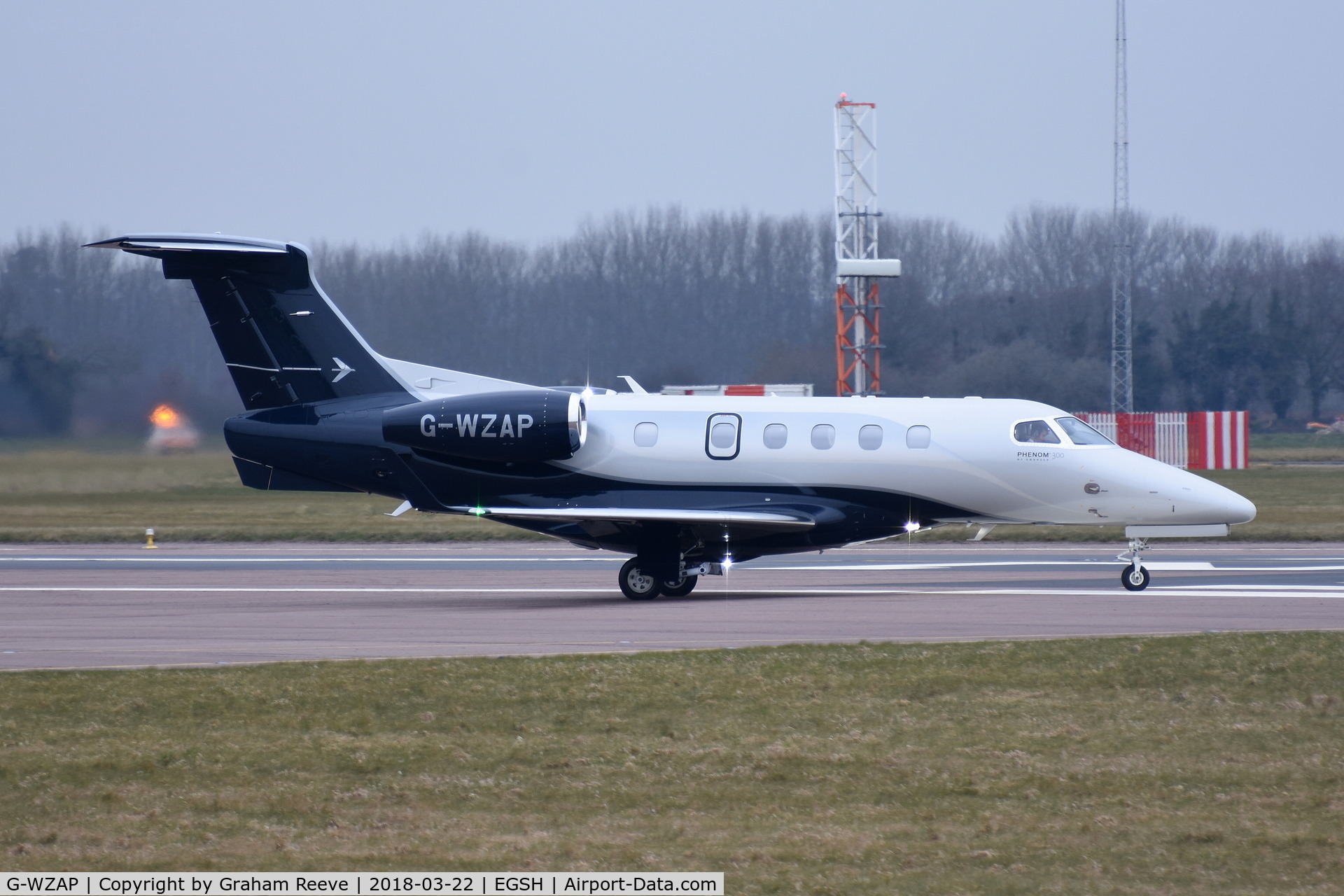 G-WZAP, 2017 Embraer EMB-505 Phenom 300 C/N 50500438, About to depart from Norwich.