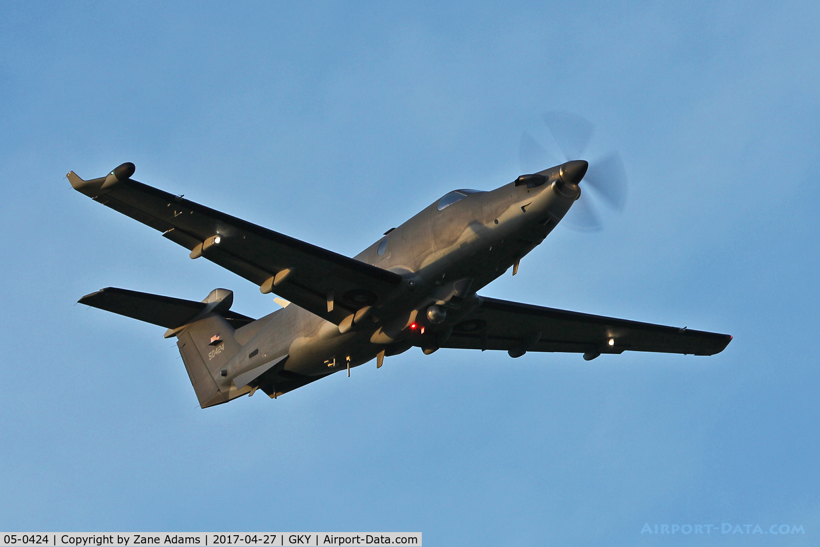 05-0424, 2001 Pilatus U-28A Spectre C/N 424, Departing Arlington Municipal on a nighttime urban combat training mission