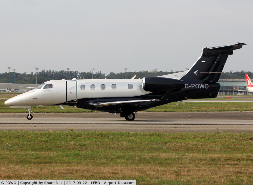 G-POWO, 2015 Embraer EMB-505 Phenom 300 C/N 50500266, Taxiing to the General Aviation area...