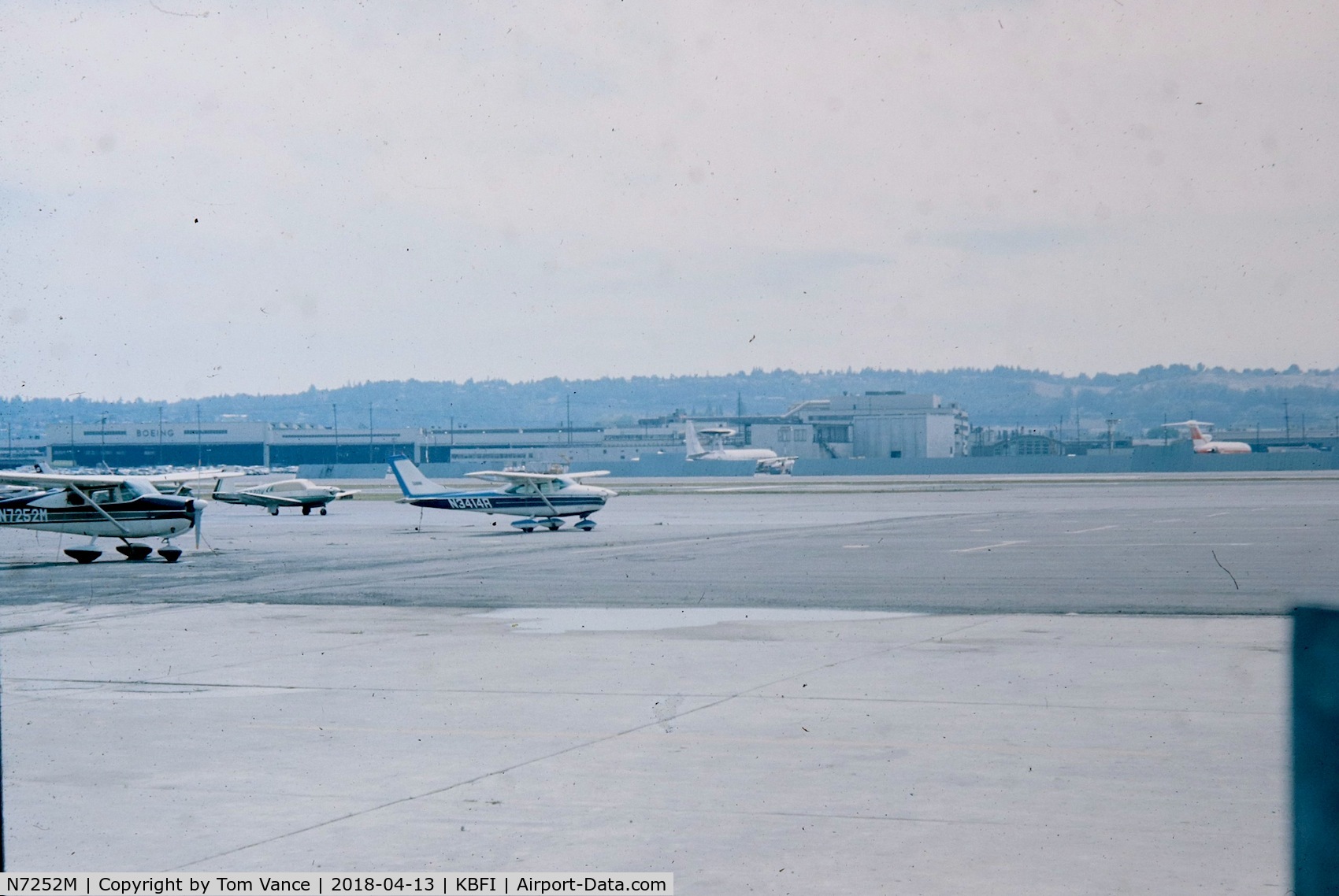 N7252M, 1958 Cessna 175 Skylark C/N 55552, Boeing Field circa 1973-75 - westerly view near the BFI terminal. The 727 is PSA.
