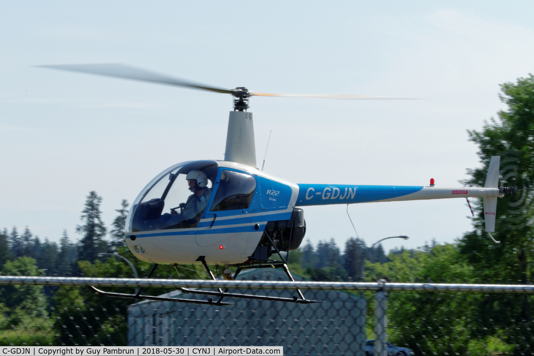 C-GDJN, 1991 Robinson R22 Beta C/N 1795, I think he's going to the fuel pumps but I'm not 100% certain